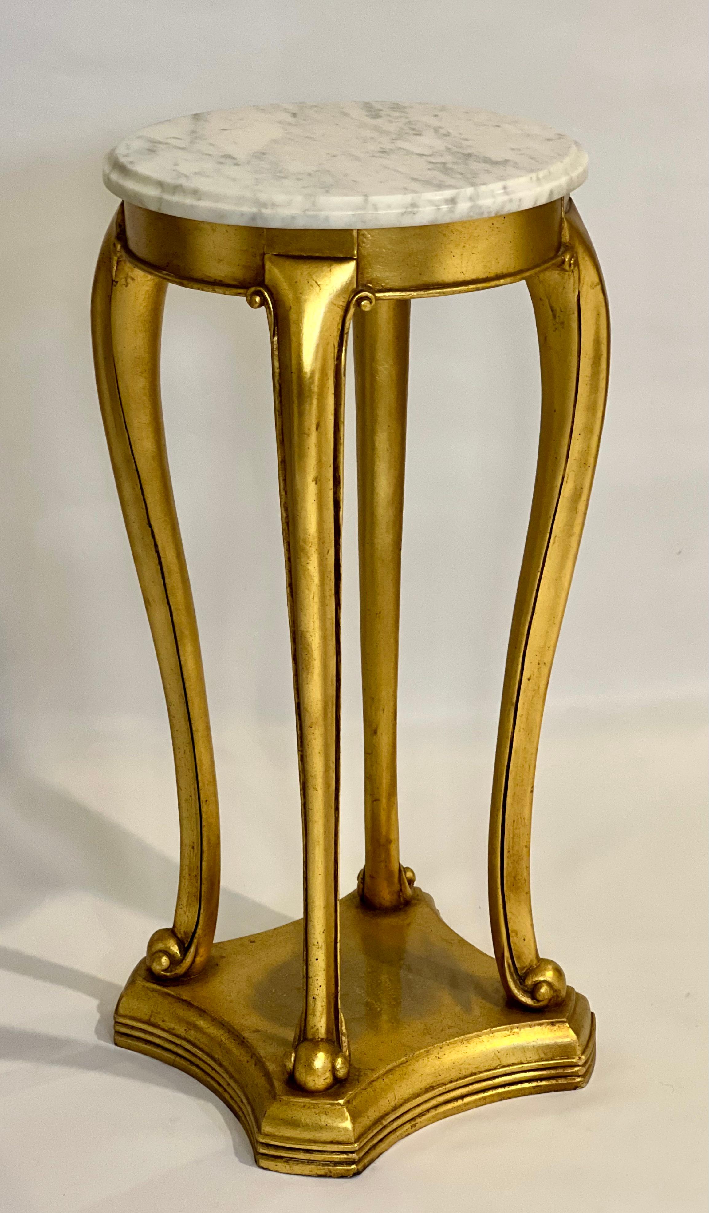 Antique Regency style gilt wood marble top pedestal or plant stand, c. late 19th century.

Fantastic gilt pedestal with cabriole legs and scrolled feet set upon an in-curving stepped base. Carved detail accentuates the base as well as the length of