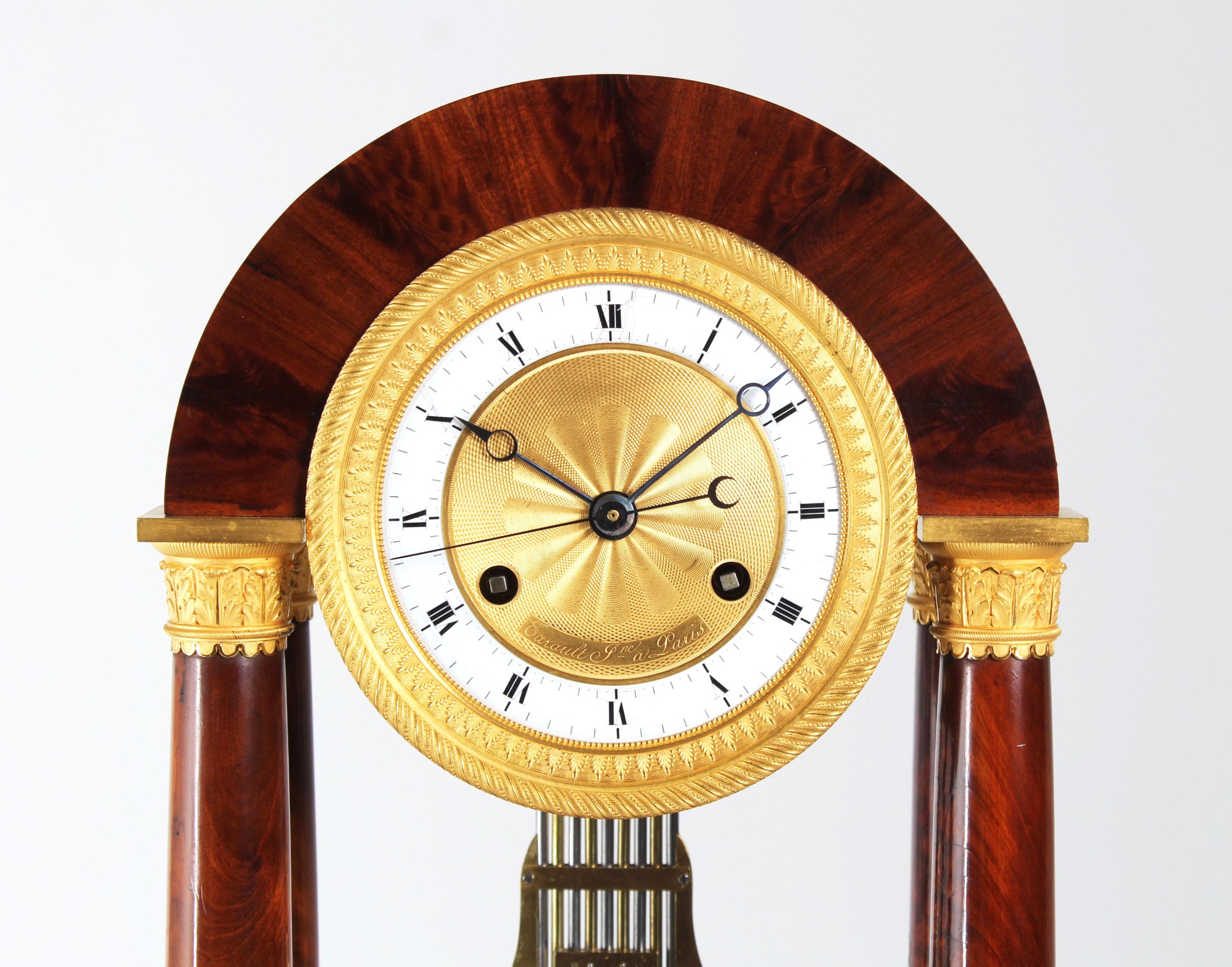 Table regulator - Precision portal clock

Paris
mahogany, bronze, enamel
around 1825

Dimensions: H x W x D: 49 x 28 x 15 cm

Description:
Antique precision portal clock from the 1820s.
The round arch in which the movement is mounted is supported by