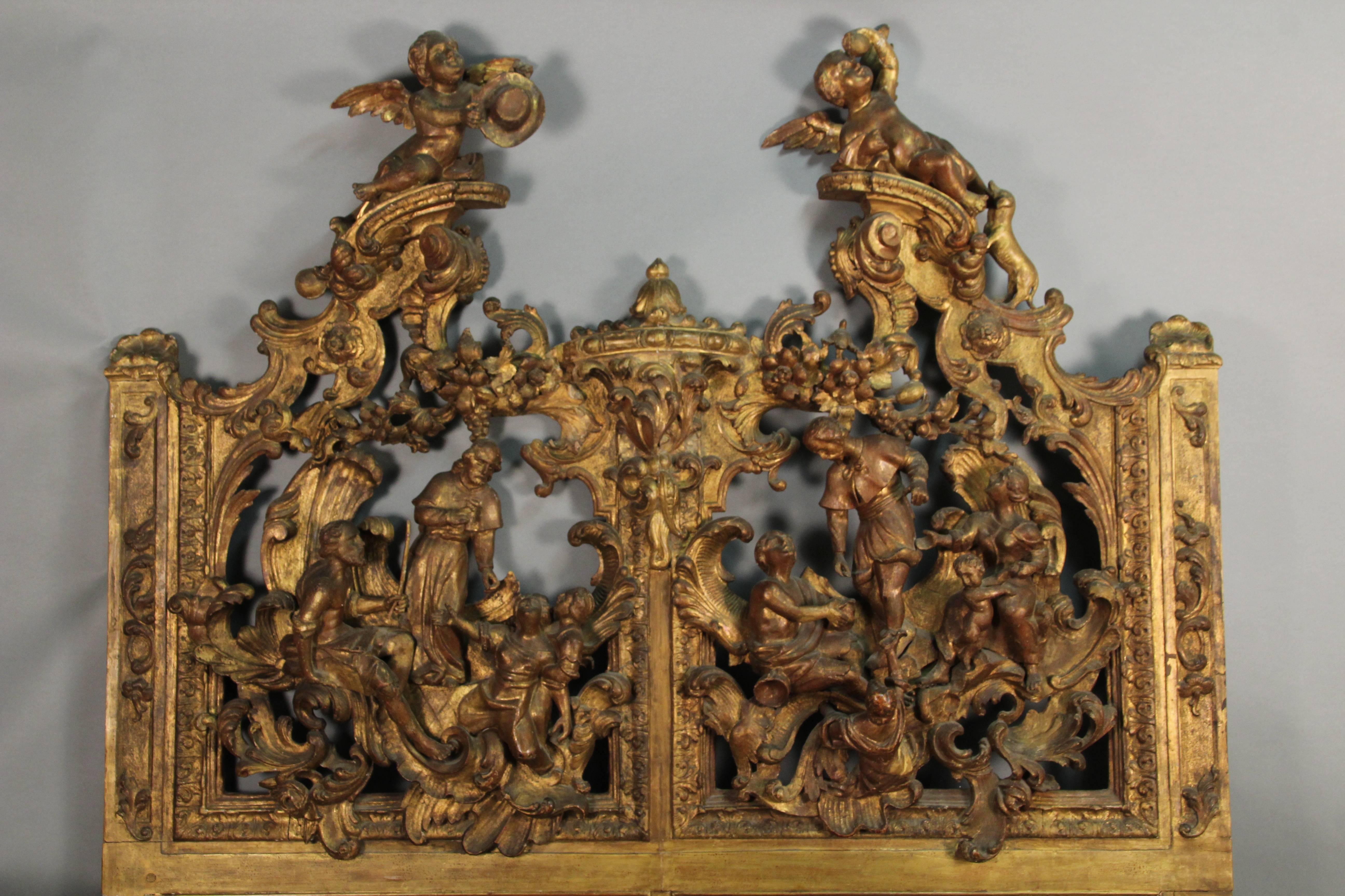 Early 19th century European carved giltwood religious panel. Incredible carving. Piece was converted in bed headboard this century.