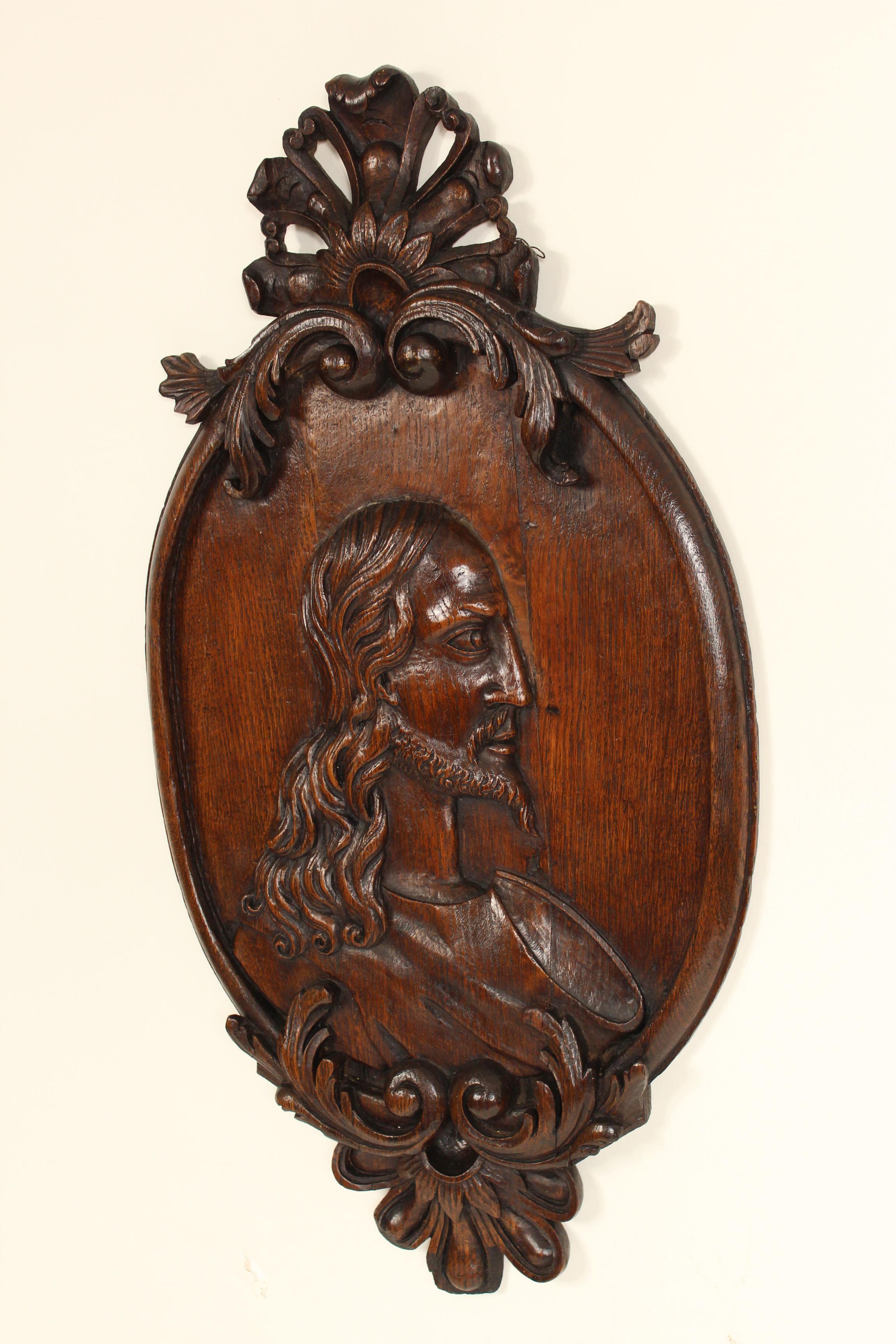 Carved oak religious carving, 19th century. This is an excellent quality wood carving with a nice old patina.