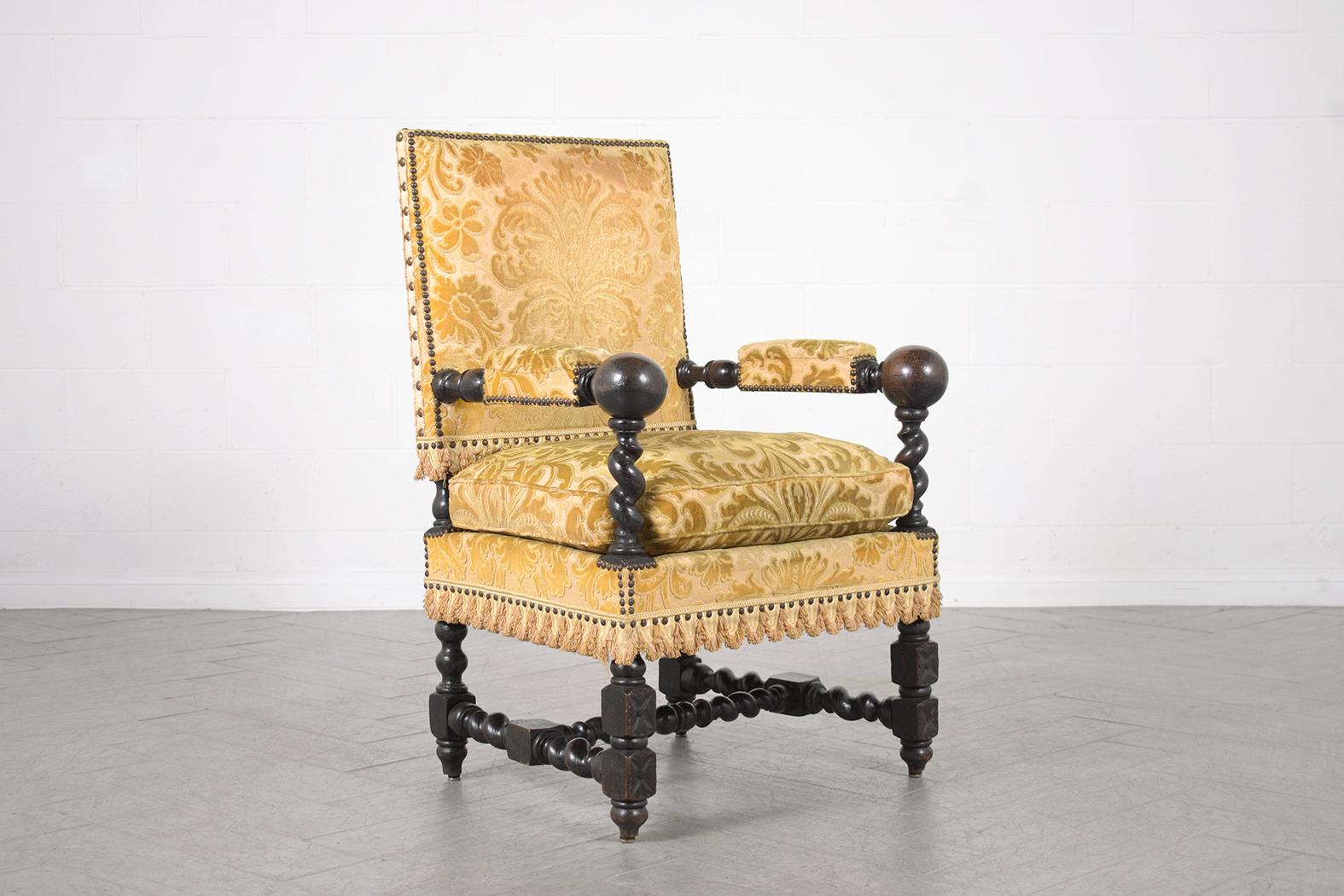 Carved 19th Century French Oak Armchair: Dark Walnut Patina Finish & Floral Upholstery For Sale