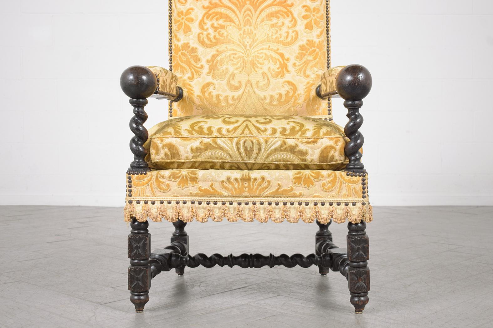 Jacobean 19th Century French Oak Armchair: Dark Walnut Patina Finish & Floral Upholstery For Sale