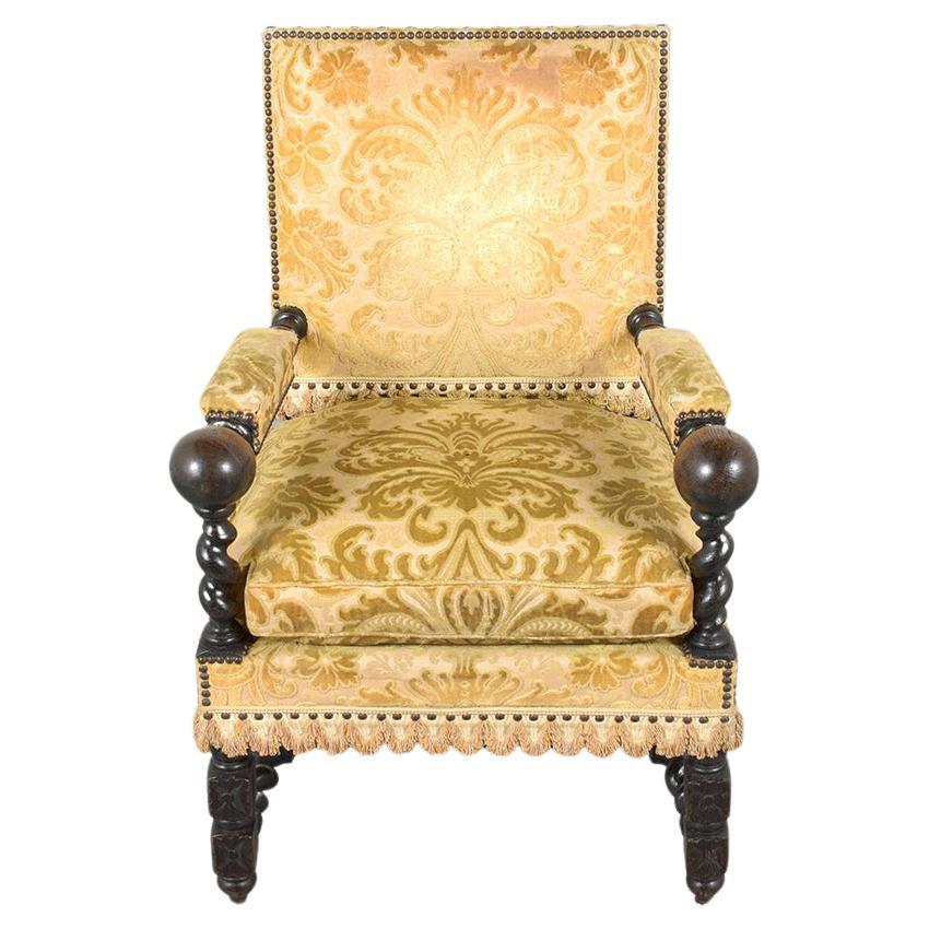 19th Century French Oak Armchair: Dark Walnut Patina Finish & Floral Upholstery For Sale