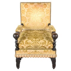 19th Century French Oak Armchair: Dark Walnut Patina Finish & Floral Upholstery