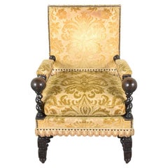 Antique 19th Century French Oak Armchair: Dark Walnut Patina Finish & Floral Upholstery