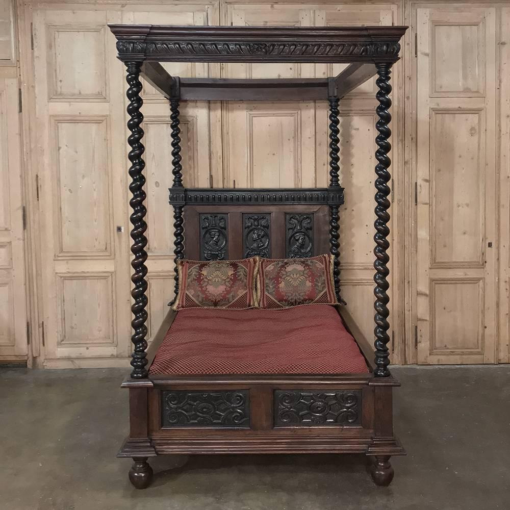 19th century Renaissance four-poster bed canopy bed will make you sleep like royalty! Barley twist columns serve as corner posts holding the canopy above, with intricately hand-carved panels appearing on the headboard, footboard, and even the tall,