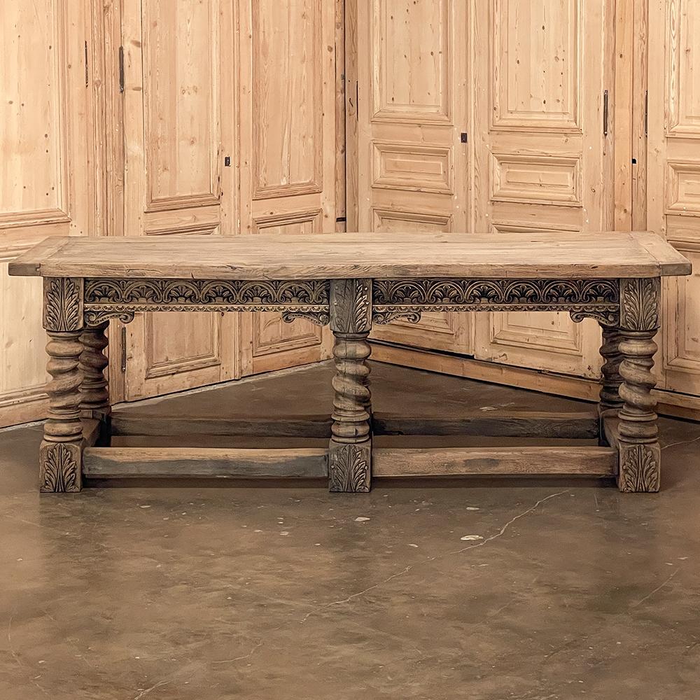 This handsome 19th Century Renaissance Library ~ Conference table, also great as an Antique Conference Table, was hand-hewn from dense, old-growth quarter sawn white oak to last for centuries! The design features six massive barley twist column legs