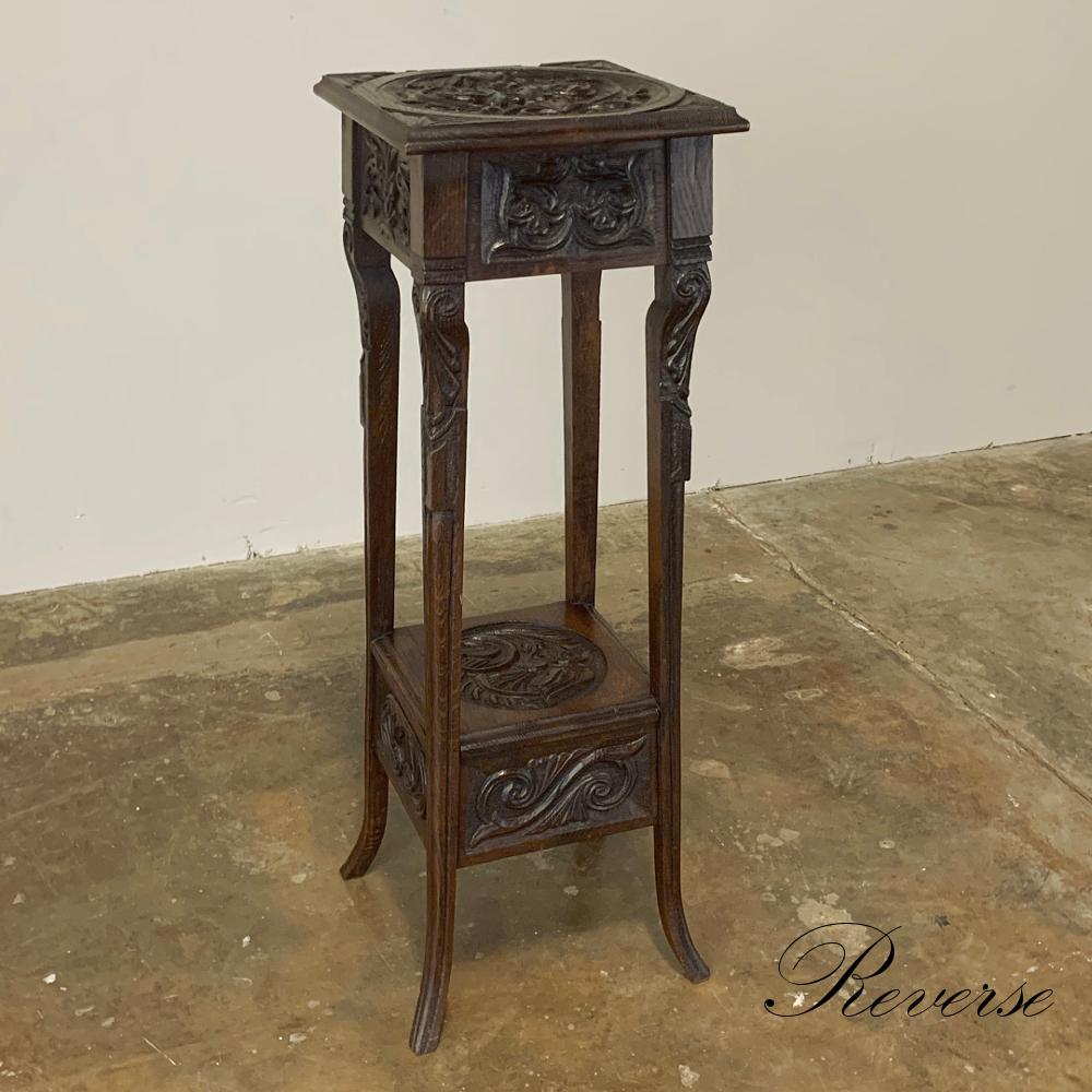 19th century Renaissance pedestal is the ideal platform for your statuary, vases, or objects d'art! Carved on the top and lower shelf, all four aprons above and below, and even all four legs, it is a work of art unto itself,

circa