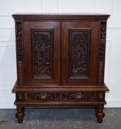 19TH CENTURY RENAISSANCE STYLE FRENCH CARVED WALNUT CABINET WiTH SHELVES