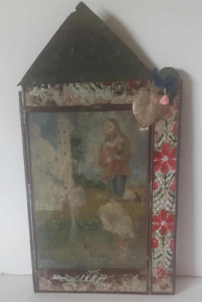 19th Century Retablo, St. Isidro Painted on Tin, in Original Embossed Tin Frame In Distressed Condition In Van Nuys, CA