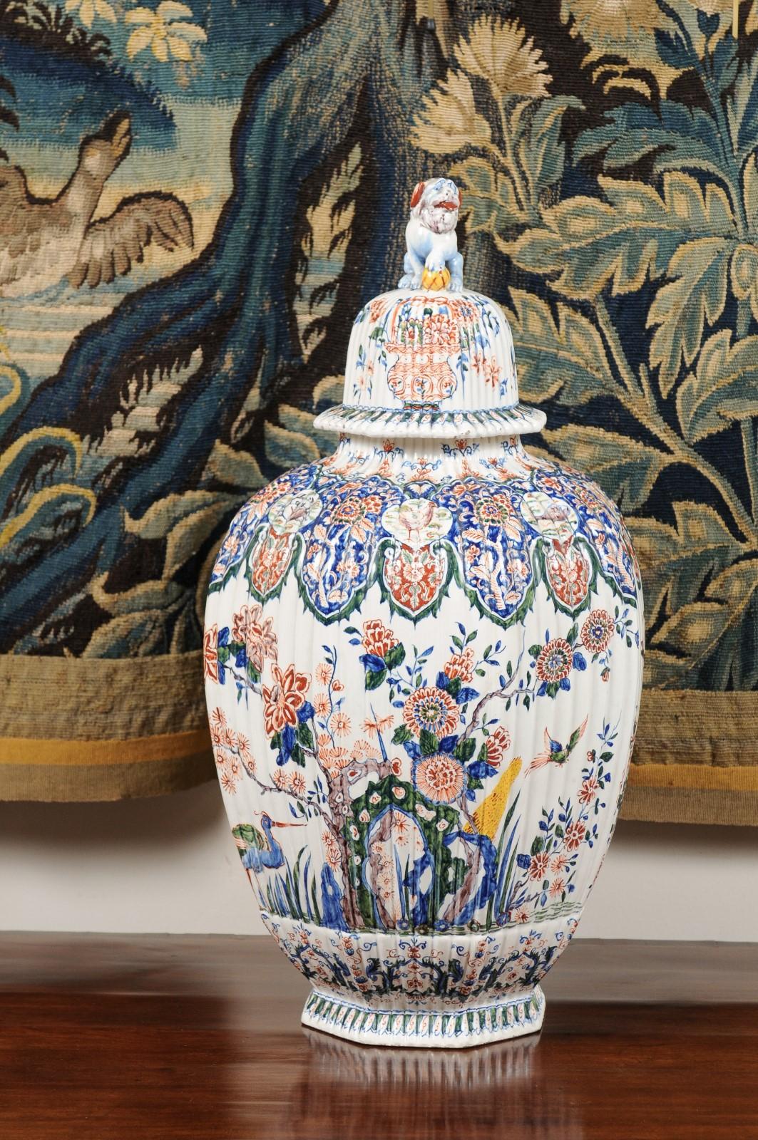 19th century Ribbed Polychrome Delft Urn with Lid featuring Lion Finial.