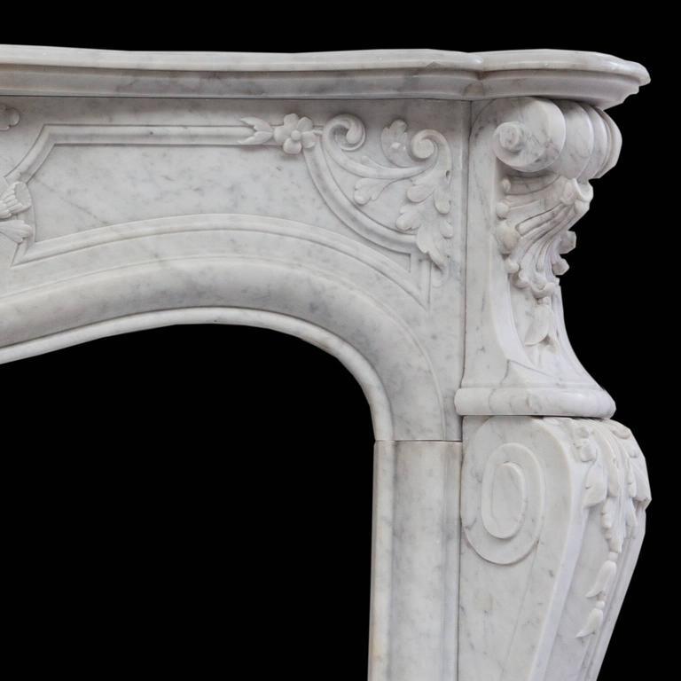 Hand-Carved 19th Century Rich Sculpted Louis XVI White Carrara Marble Fireplace Mantel For Sale