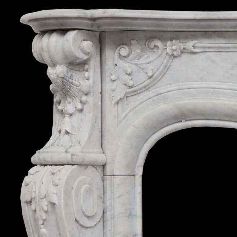 Carved 19th Century Rich Sculpted Louis XVI White Carrara Marble Fireplace Mantel For Sale