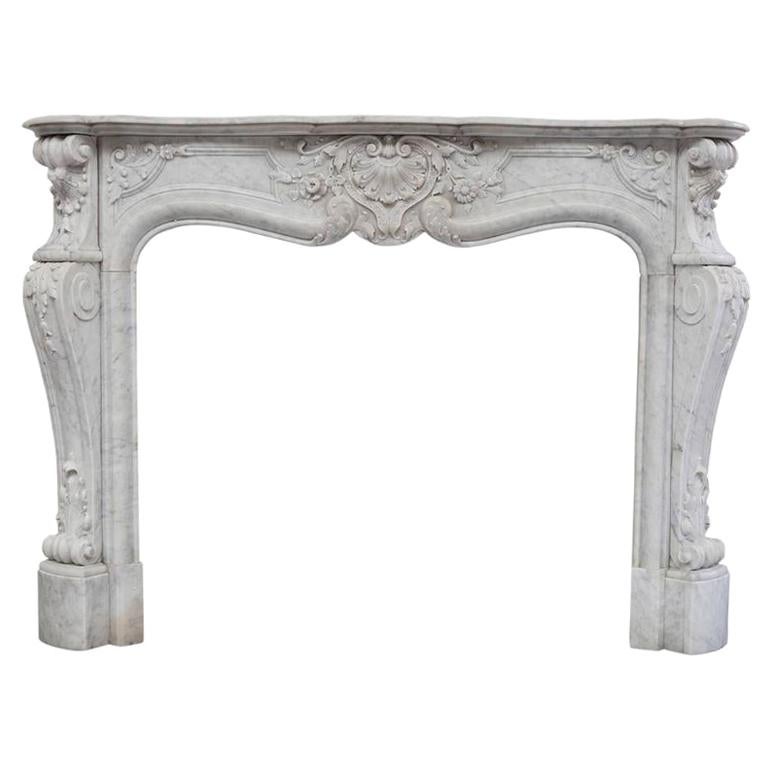 19th Century Rich Sculpted Louis XVI White Carrara Marble Fireplace Mantel For Sale