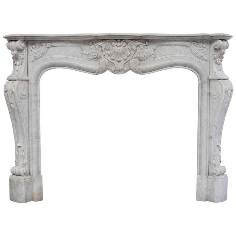 19th Century Rich Sculpted Louis XVI White Carrara Marble Fireplace Mantel For Sale