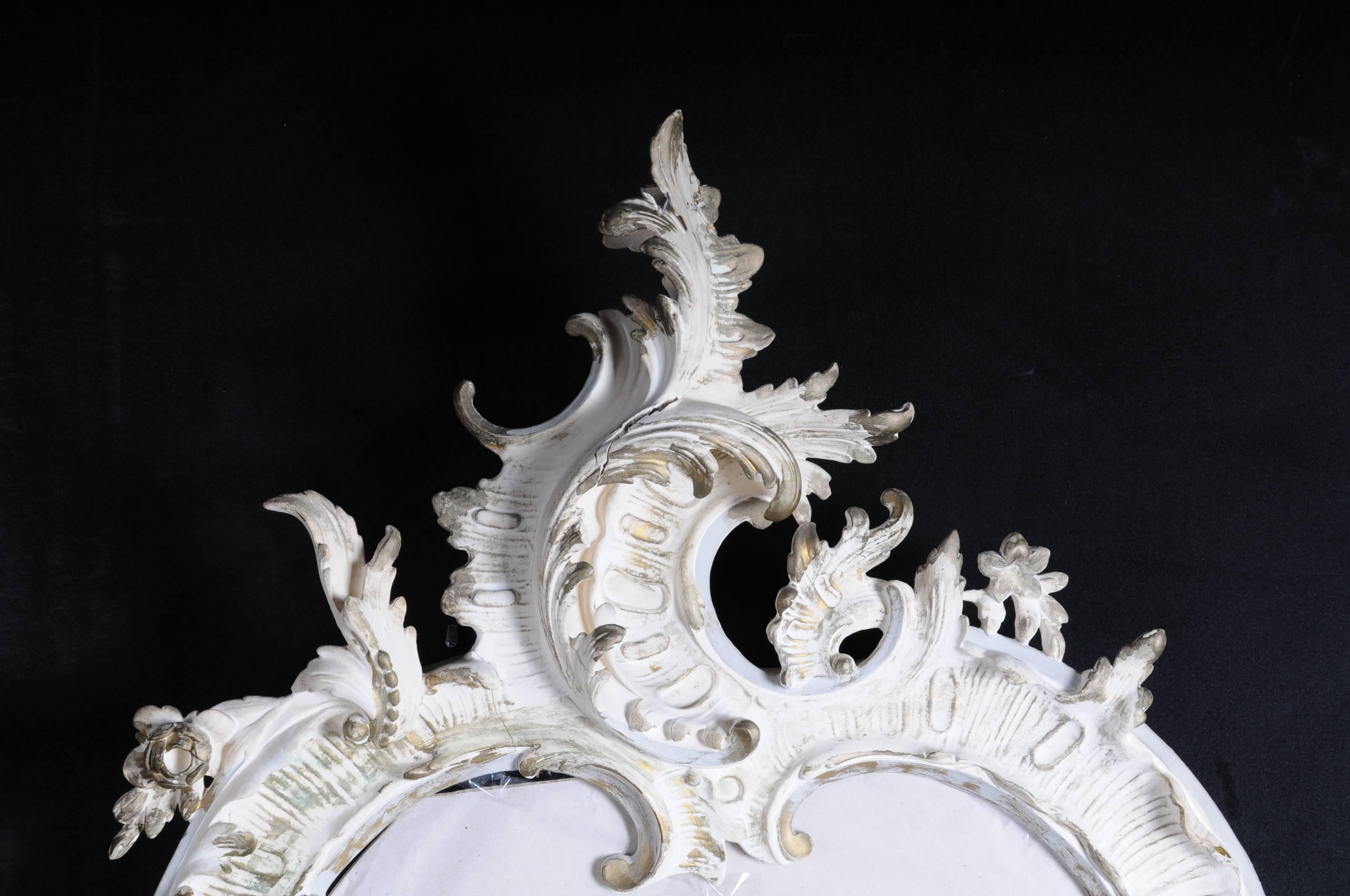 Solid wood carved frame, white painted. Partially gilded. Entire body decorated with rocaille ornaments. Extremely decorative, circa 1870.


(M-23).