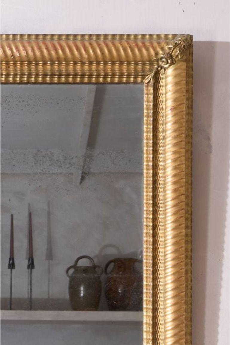 This is a very elegant and high quality 19th century French gilt mirror with thick gesso decoration. The mirror plate is totally original and has a nice amount of foxing.
Height 66cm Width 53cm