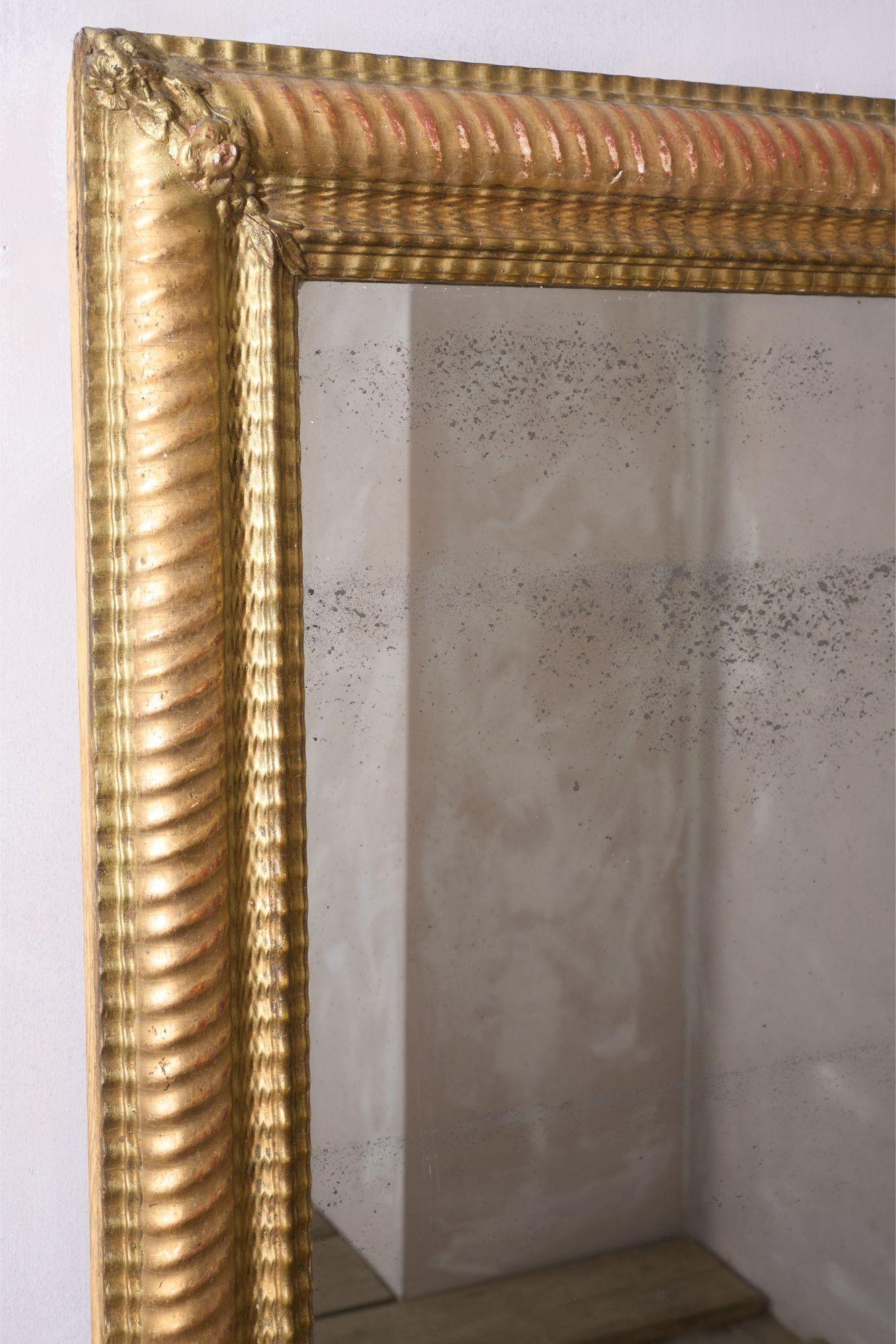 19th Century 19th century Rippled gilt wall mirror
