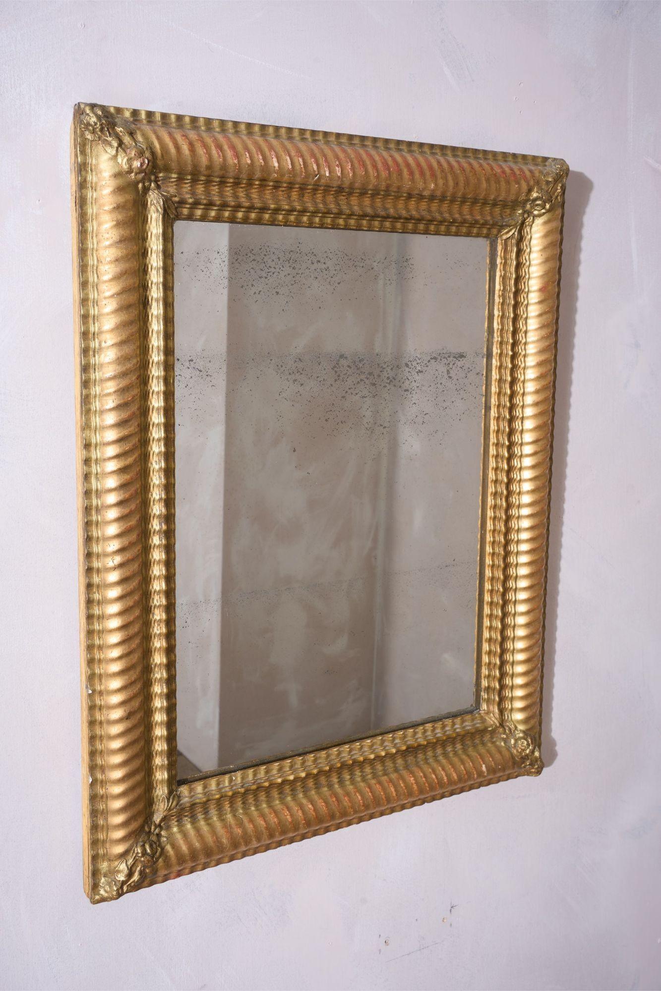 Mirror 19th century Rippled gilt wall mirror
