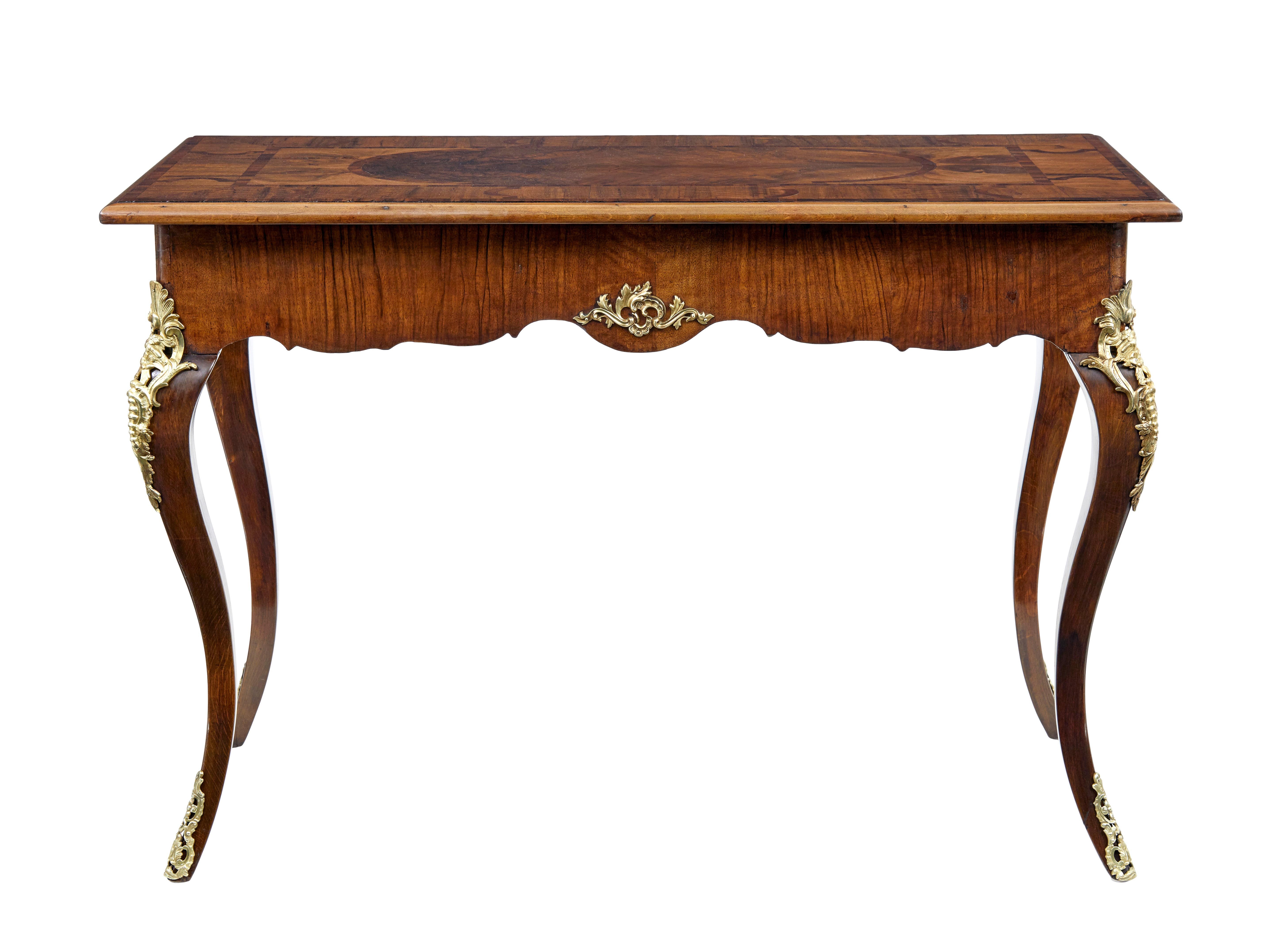 Hand-Crafted 19th Century rococo revival walnut and ormolu side table For Sale
