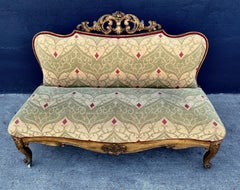 Sillón o banco dorado de estilo rococó del siglo XIX