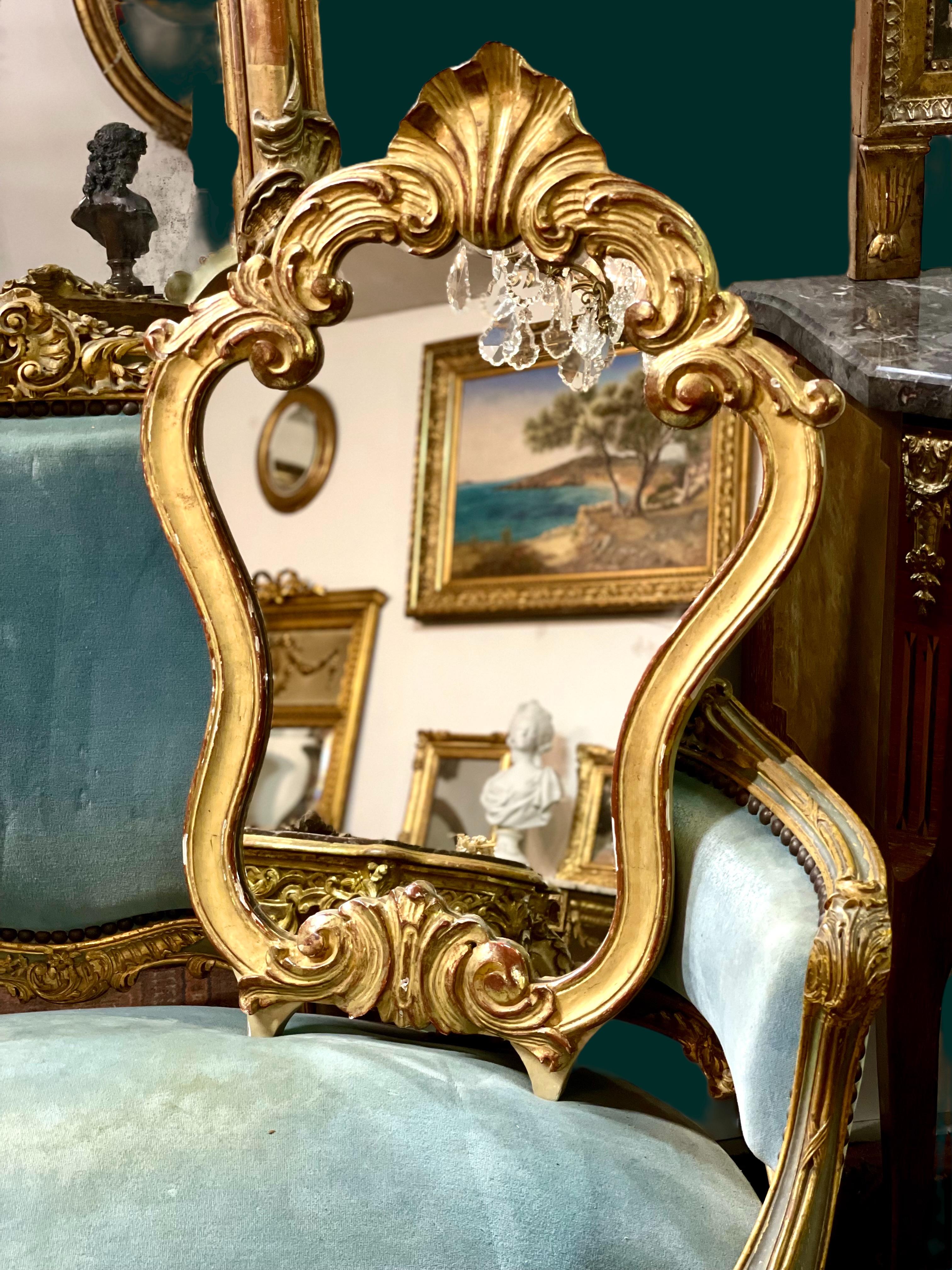 Miroir mural en bois doré de la Régence du XIXe siècle en vente 8