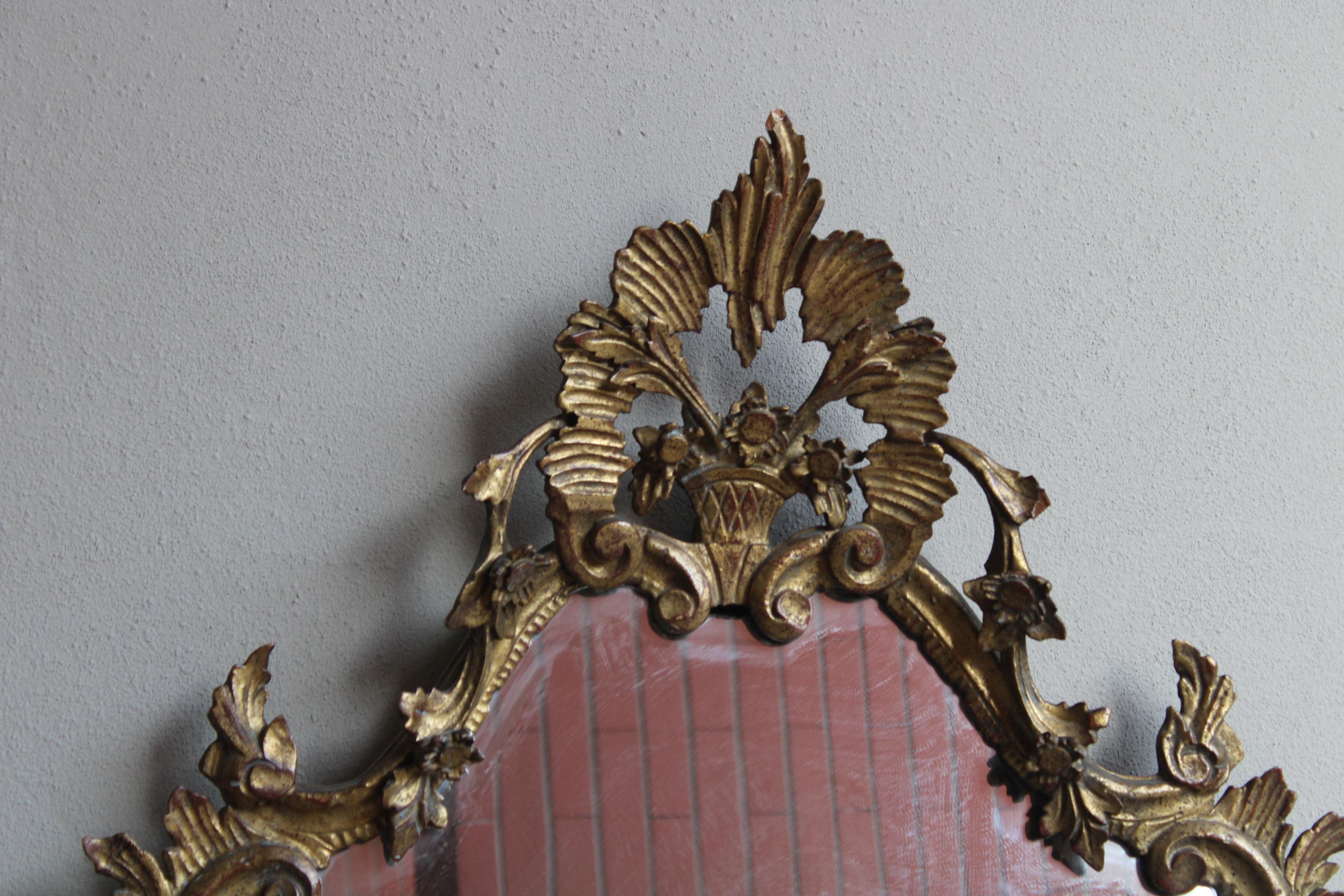 19th century Rococo style carved wall mirror from piedmont region, Italy.
 