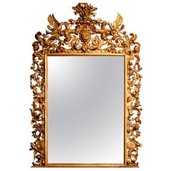 Miroir italien rococo du 19ème siècle à eau et doré à la feuille