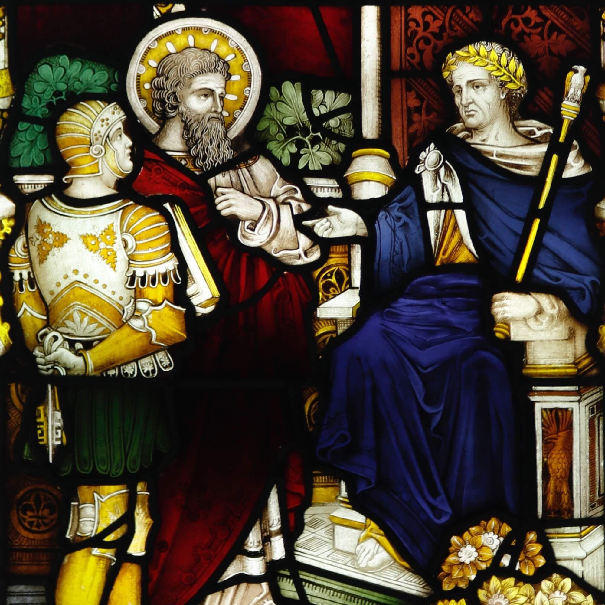 A good condition and richly toned Roman style stained glass window circa 1890. This spectacular 19th century stained glass panel depicts a solider and a religious, saint-like figure standing before a Roman Emperor, possibly of the Imperial era when