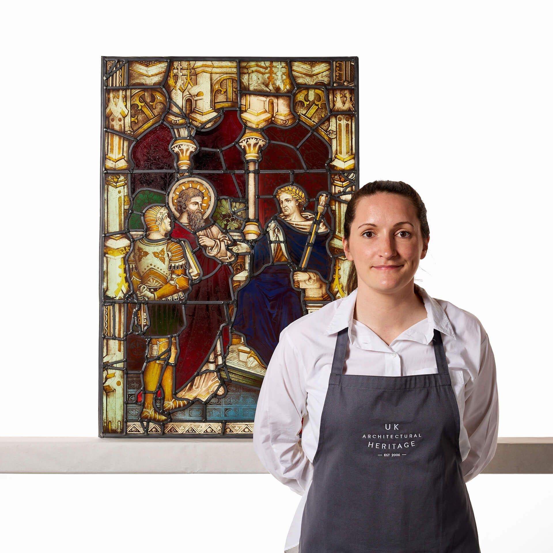 A good condition and richly toned Roman style stained glass window circa 1890 from the studio of Clayton & Bell. This spectacular 19th century stained glass panel details a soldier and a religious, saint-like figure standing before a Roman official,