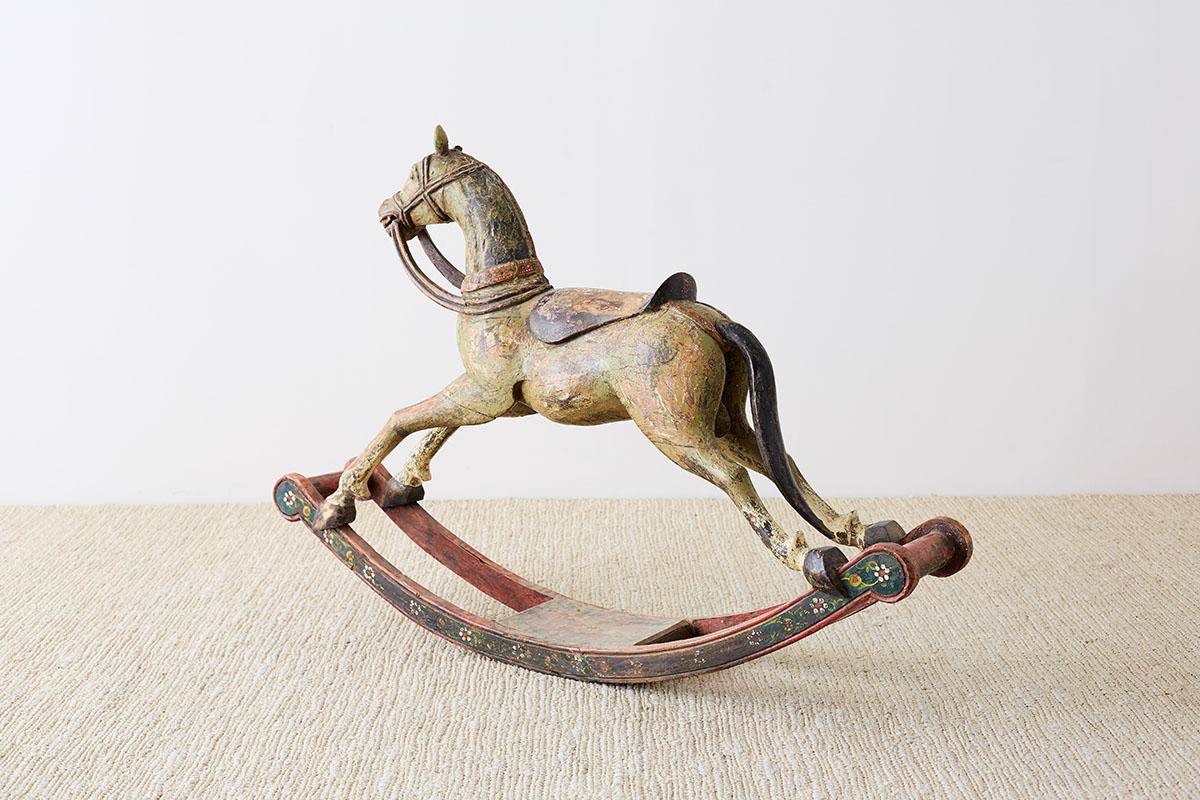 Folk Art 19th Century Romanian Polychrome Wooden Rocking Horse For Sale