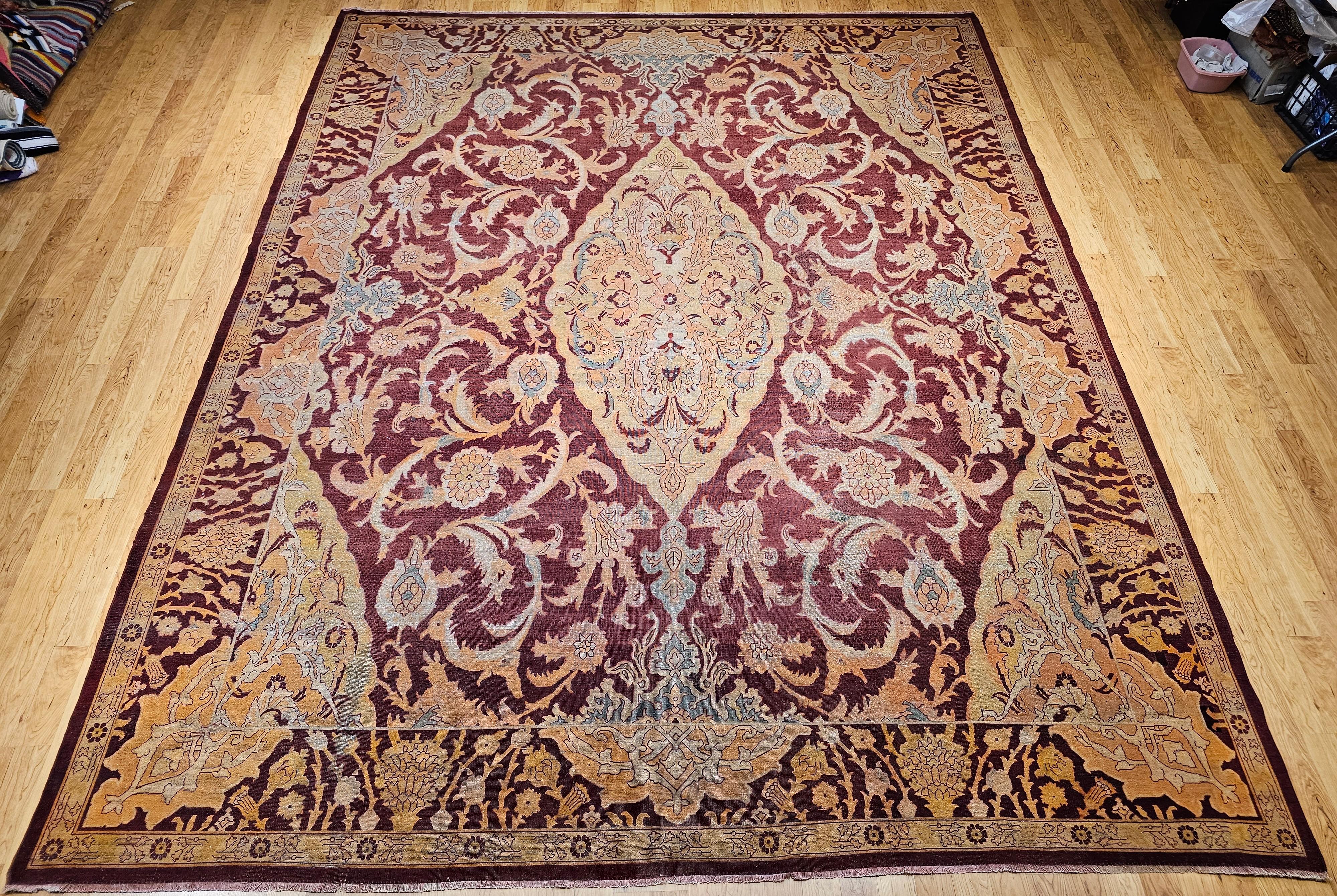 A captivating 19th century Indian Amritsar rug, handwoven in Northern India and distinguished by its refined 16th century Mughal-inspired design and harmonious color palette. This exceptional room-size piece features a majestic central medallion