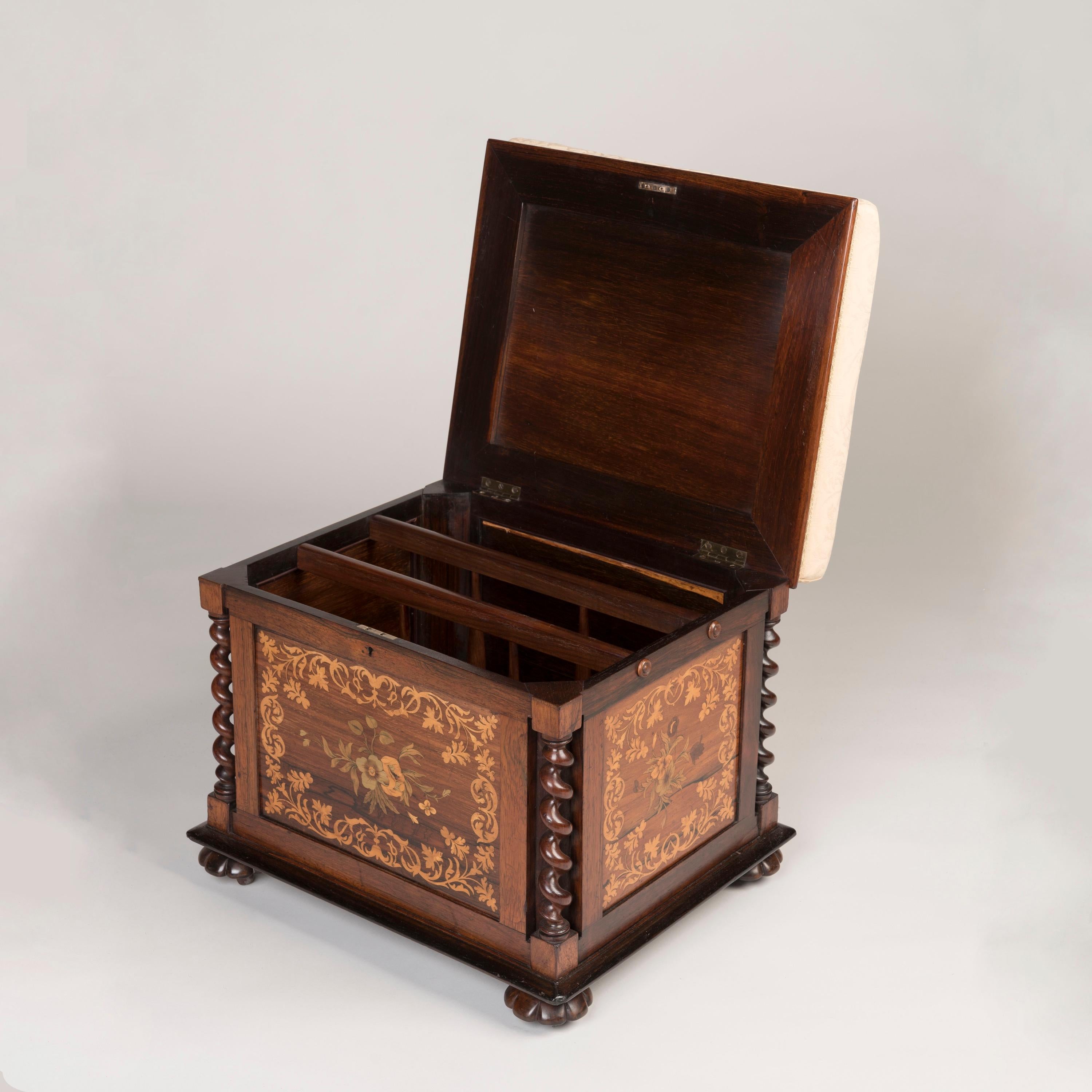 A Rosewood and Marquetry inlaid stool

A delightful and practical seat made of rosewood and incorporating marquetry inlays of boxwood and harewood, supported on hidden casters within lobed bun feet, the corner supports turned in a barley twist