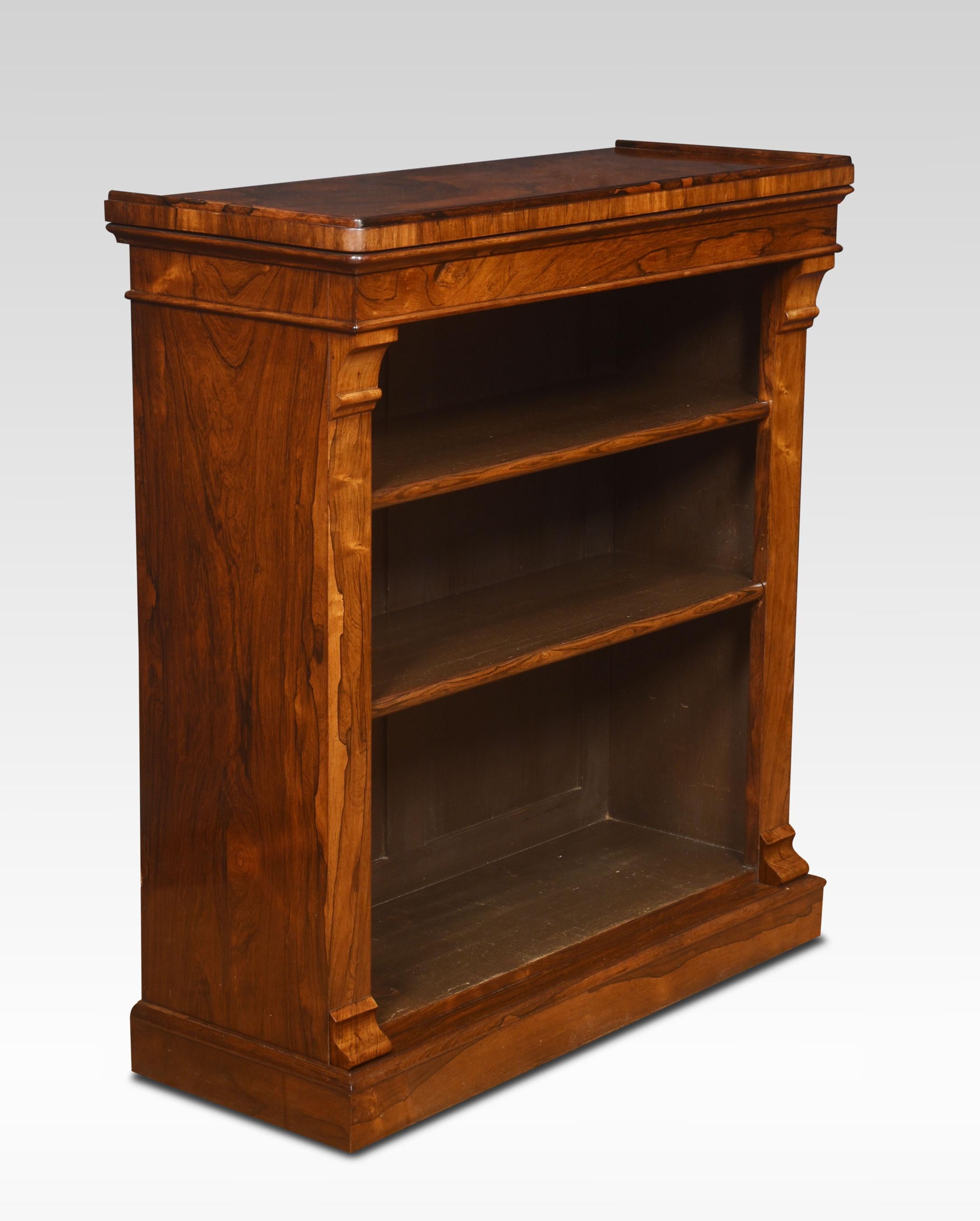 19th-century rosewood open bookcase, the rectangular well-figured top with rounded corners above moulded frieze supported on capped columns. Enclosing the fixed shelved interior, all raised up on a plinth base.
Dimensions
Height 37.5 Inches
Width