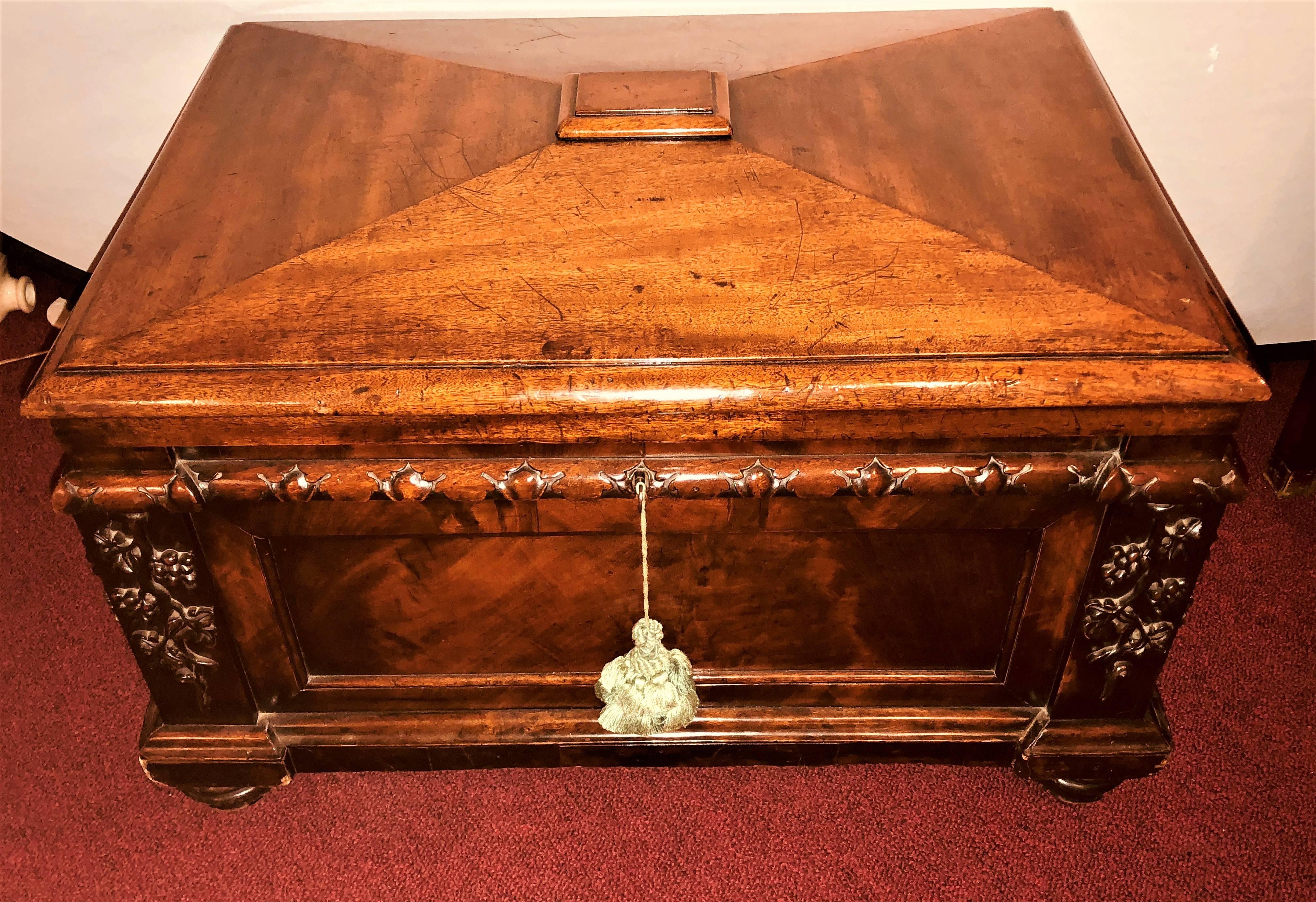 A 19th century rosewood Rococo carved wine cooler that can be used dowry chest. The strong and sturdy case having wonderful carvings of grapes throughout. The interior lead lined. 