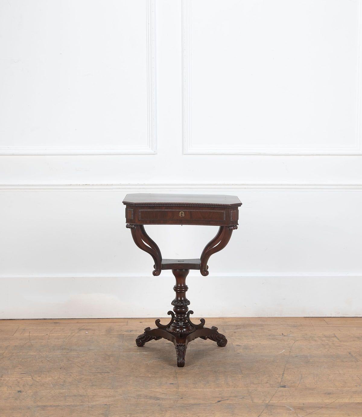 19th Century Rosewood Work table ripple moulding.

Fitted interior with amboyna lidded compartments on triform base.