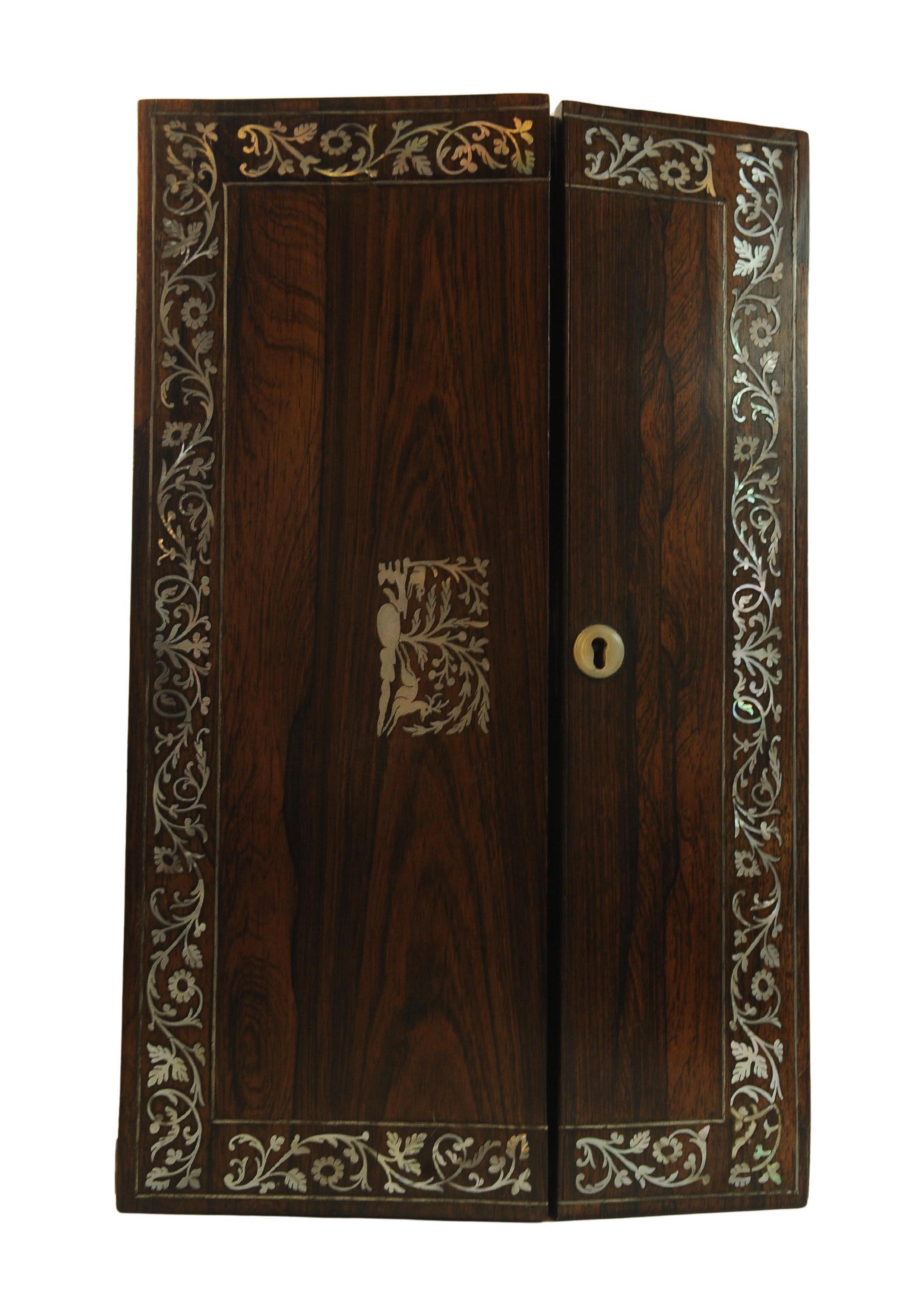 19th Century Rosewood Writing Slope Decorated With Beautiful Floral & Inlay Throughout.

Lid has a central woodland scene which is really timeless and organic.

The slope features a well executed fitted interior sadly no hidden