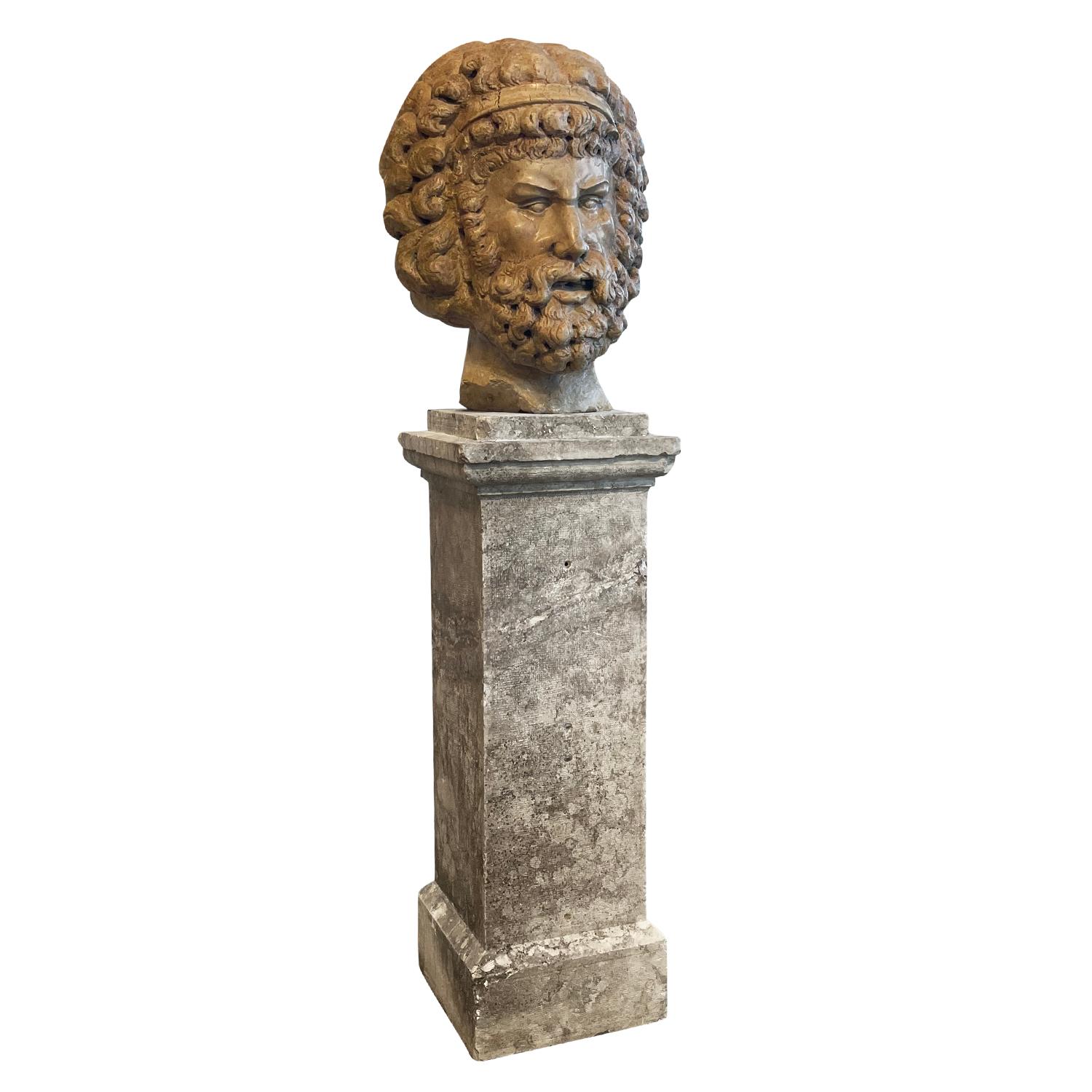 An antique hand carved Rosso Verona marble sculpture or mask of Zeus with detailed carvings, in good condition. Similar can be viewed at the temple collection in the British museum in London. Wear consistent with age and use, circa 19th century,