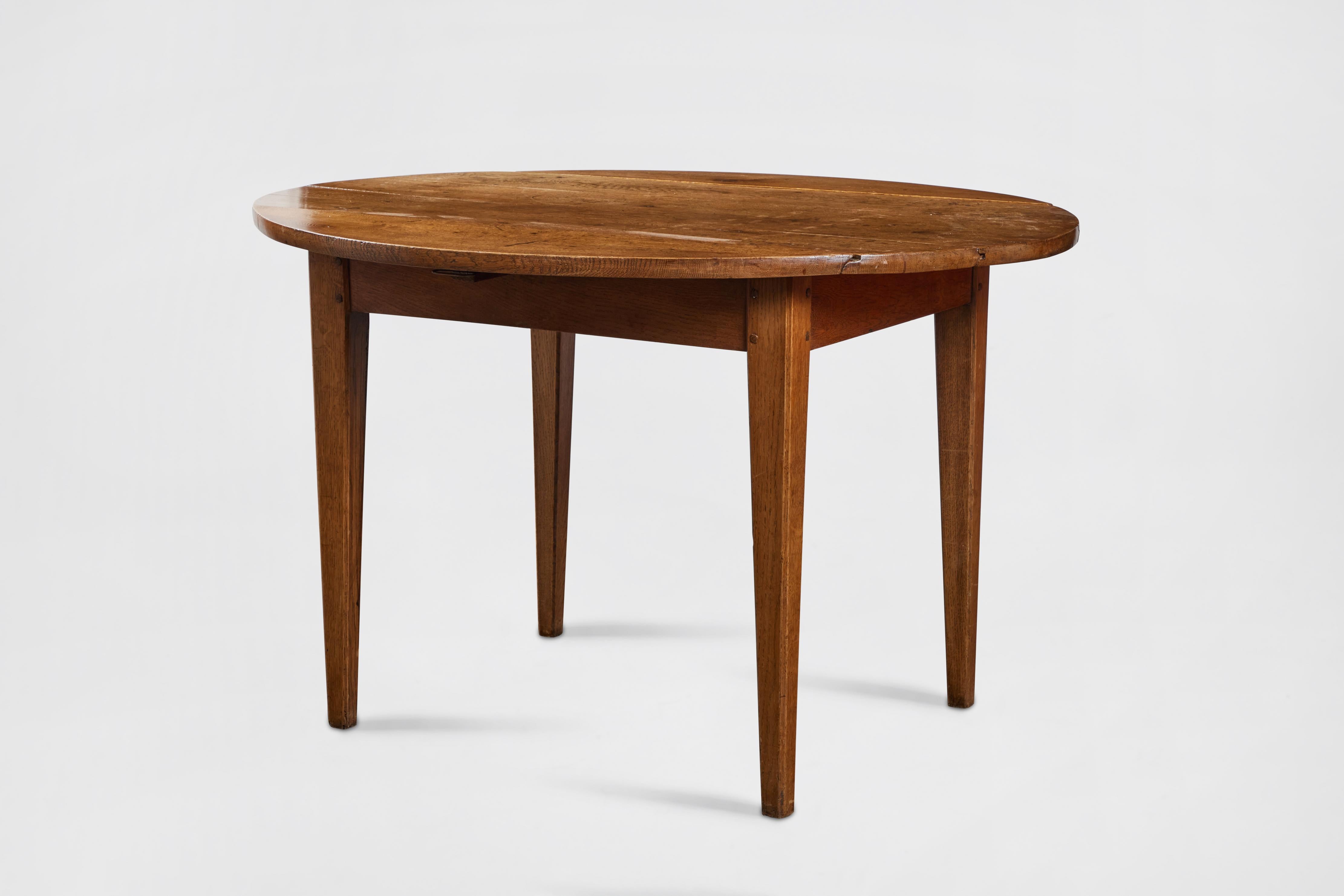 19th century round gateleg oak table, from Pierre Deux. Original hardware.