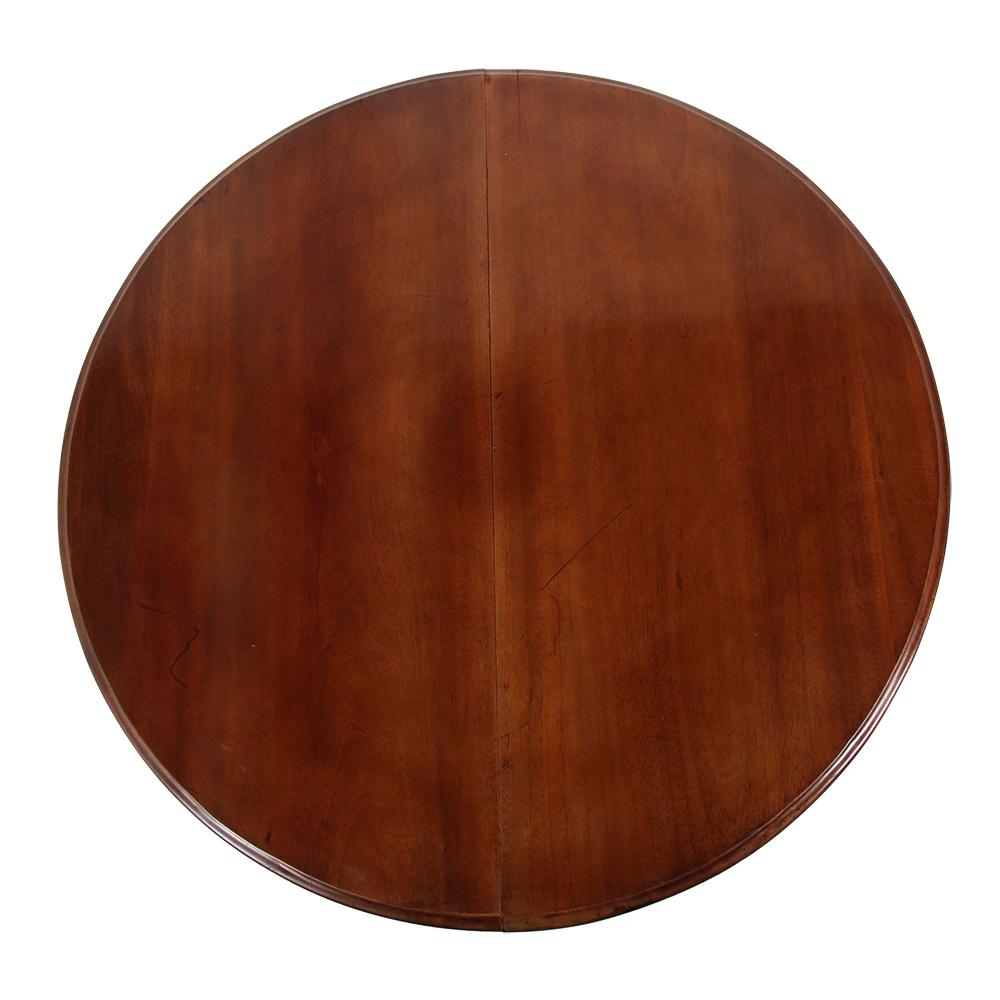 A 19th century round mahogany table, the solid plank top supported on tapering column with a triform base.
The table opens to take leaves- the originals have been lost but custom leaves can be produced.
 
    