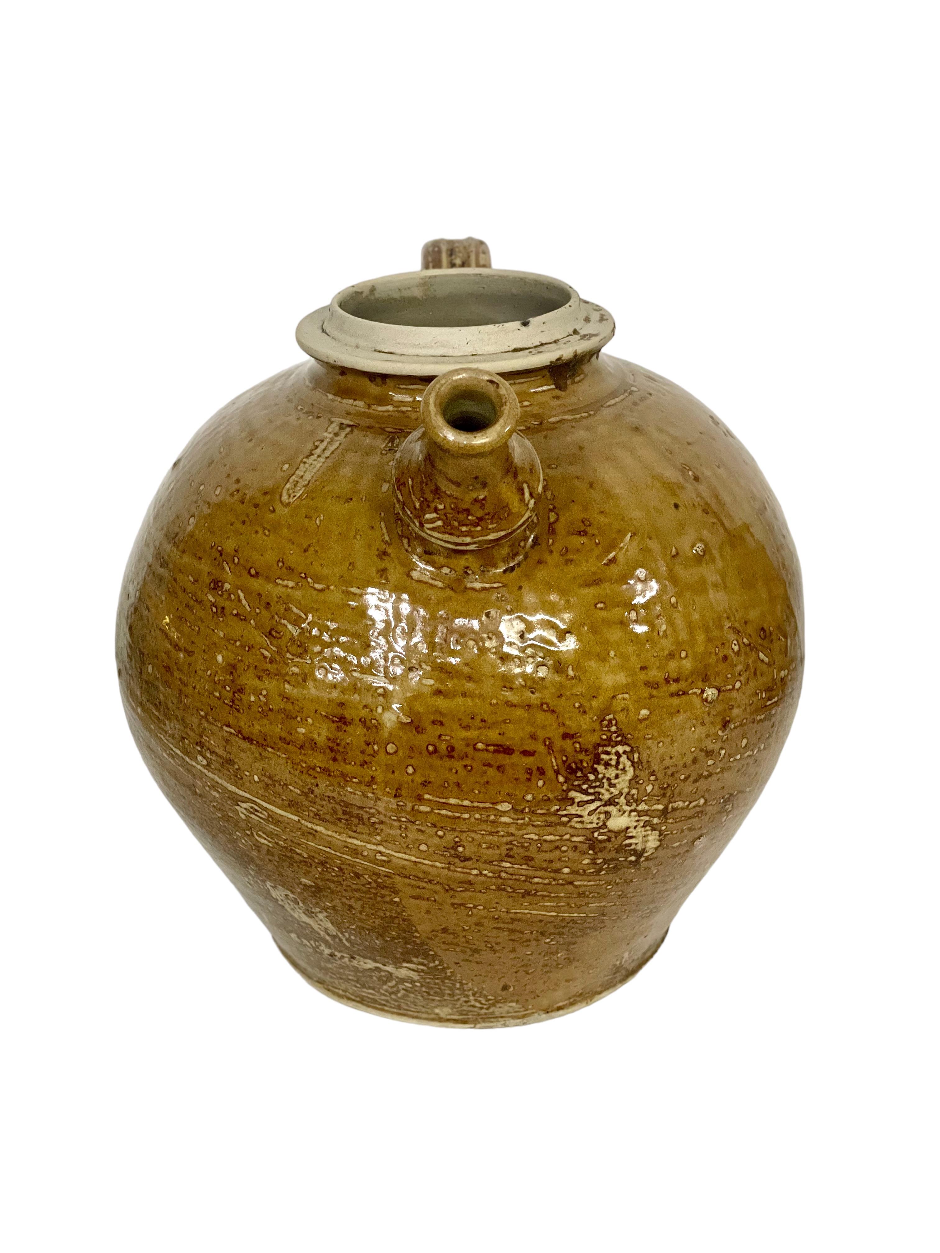 Earthenware 19th Century Rounded Walnut Oil Jar For Sale