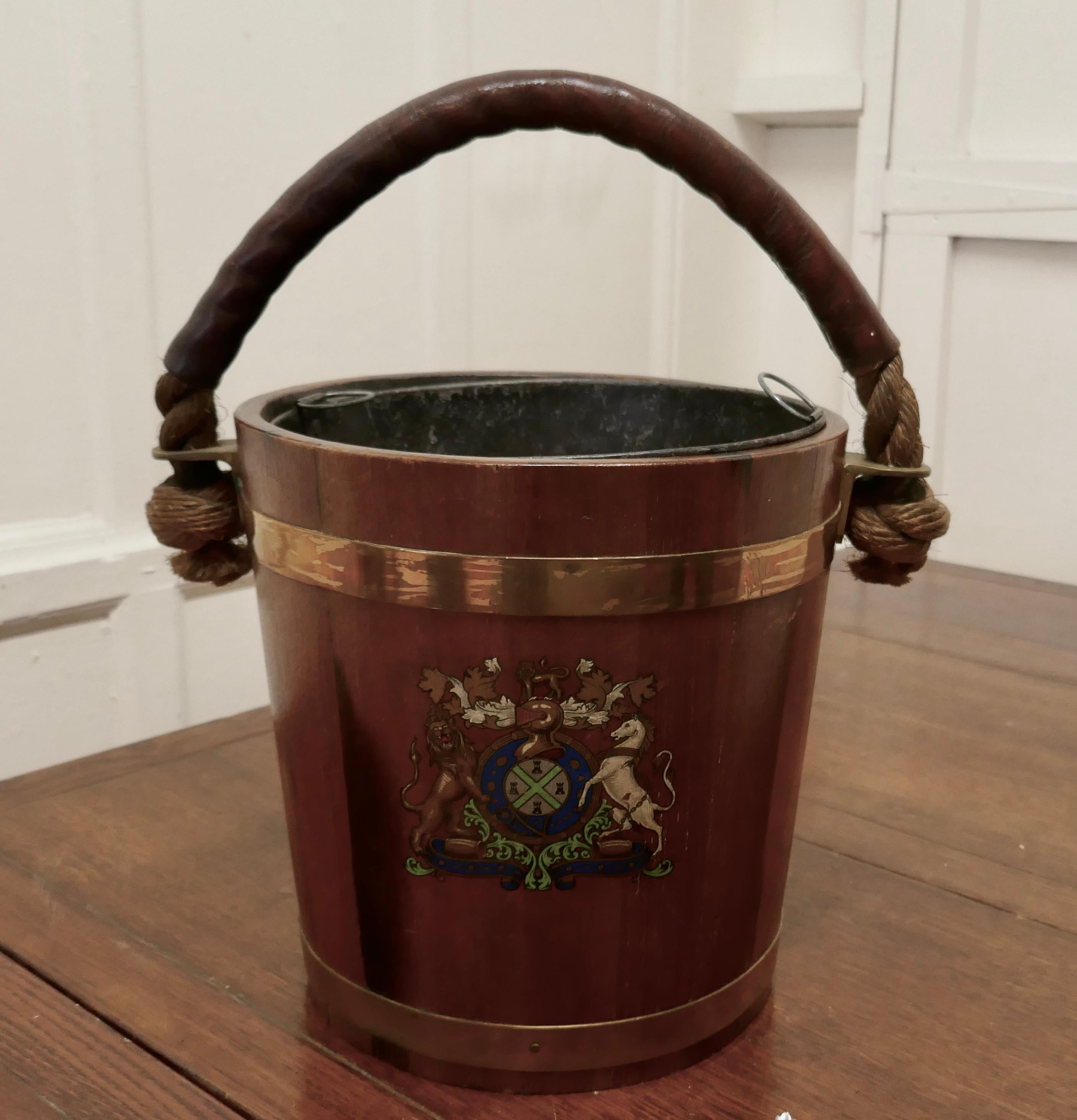 19th Century Royal Navy Oak Fire Bucket, with Plymouth Armorial Crest 

This is a superb looking piece made in Oak and decorated with the Plymouth Armorial Crest, it was used as a water carrier but now has the addition of a lift out metal liner so