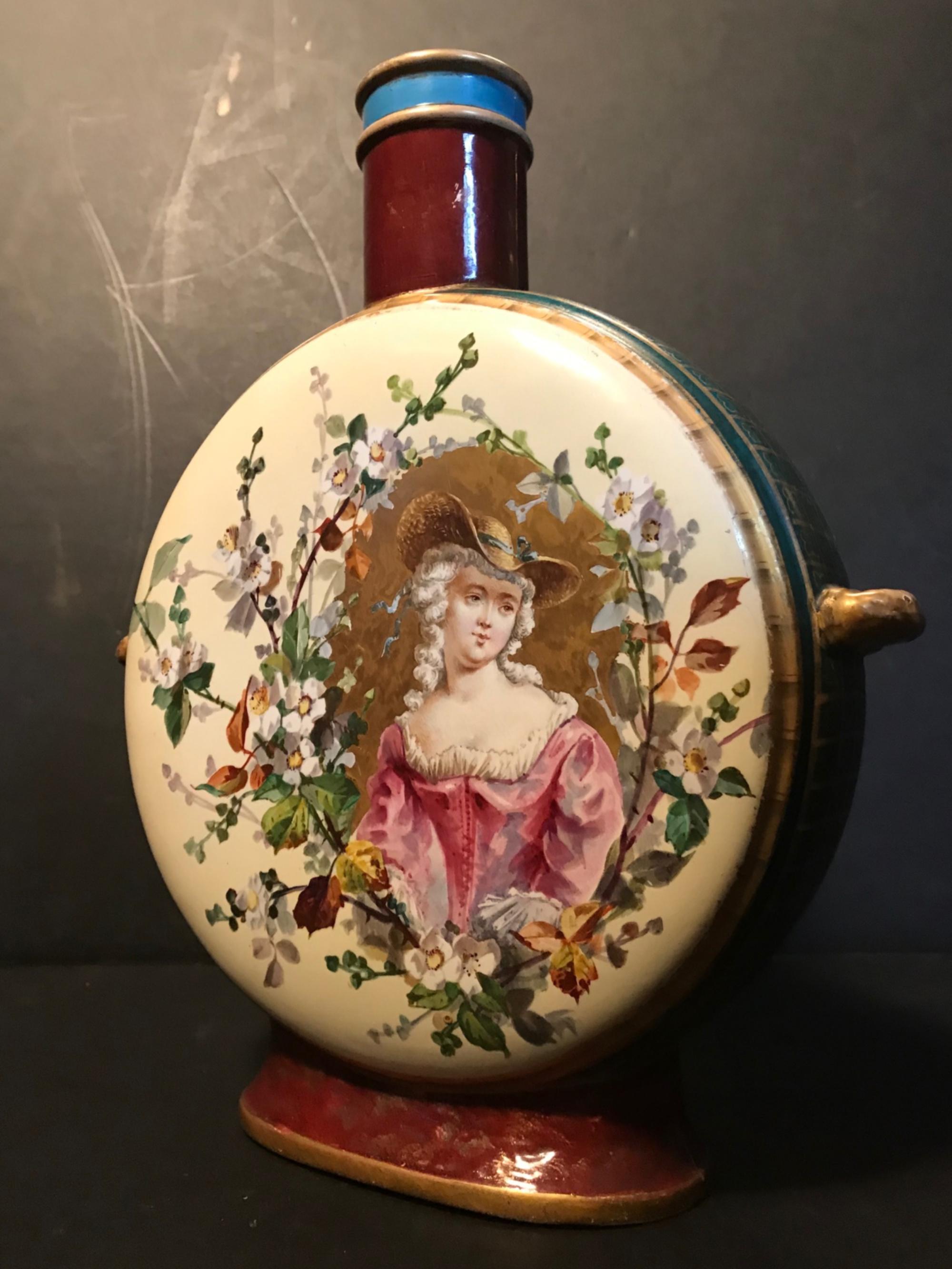 Antique 19th century Royal Vienna Belle époque Porcelain moon flask.

This extraordinary Royal Vienna porcelain moon flask is magnificent decorated with a very fine portrait painting of a classical Belle époque girl. The finely rendered hand