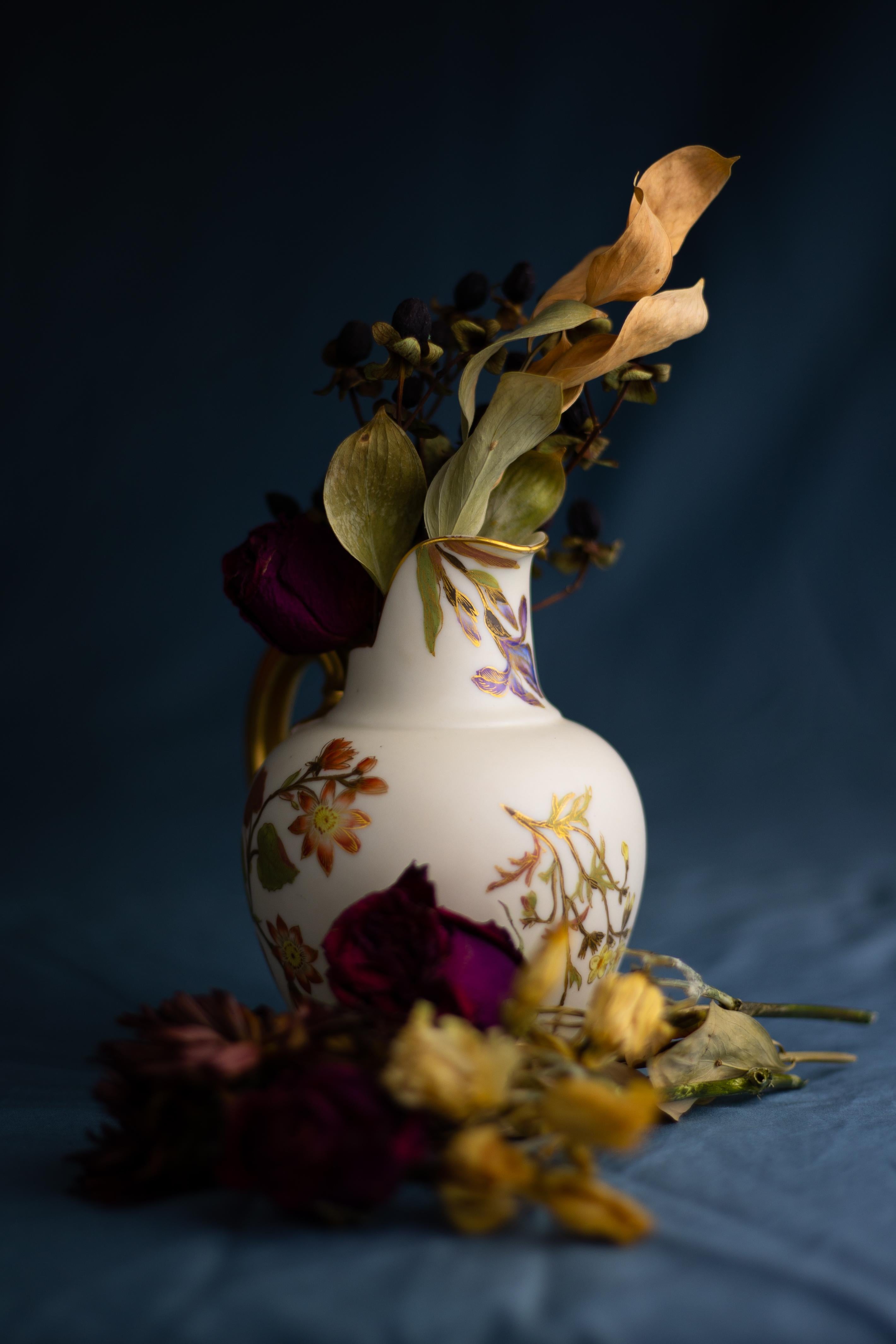 A beautiful blush porcelain pitcher in the Aesthetic style, made by Royal Worcester in 1890.

This small pitcher is decorated with hand-painted flowers in a naturalistic japonisme style, a style which was emblematic of the Aesthetic Movement. The