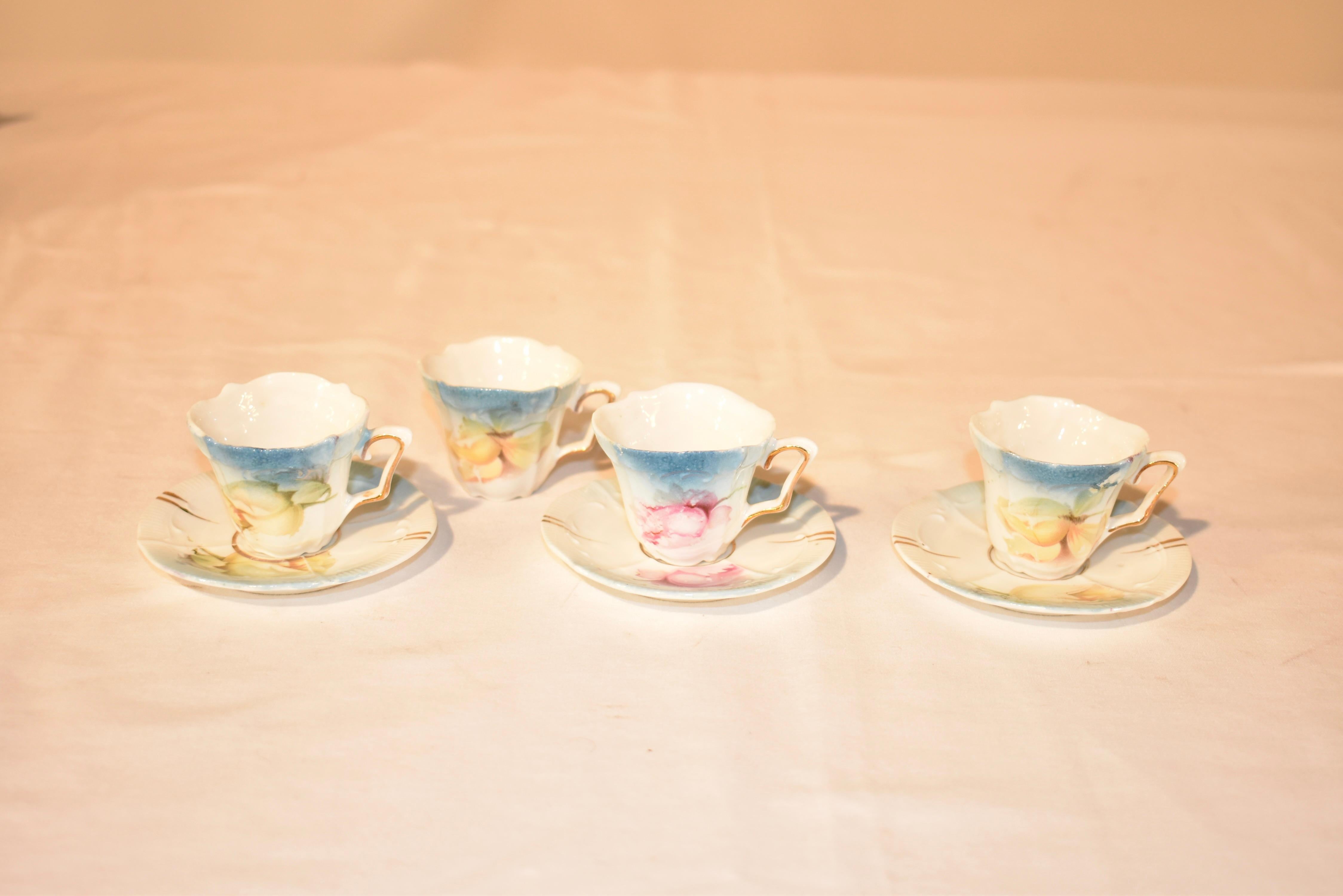 19th century RS Prussia incomplete child's tea set.  The set includes a tray, tea to, sugar and creamer, waste bowl, 4 small cups and 3 saucers and 5 small plates.  The measurements are as follows:  tea pot  5 x 2.5 x 5.5, the cups  2.25 x 1.75 x
