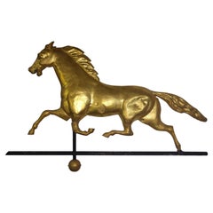 Vana meteorologica dorata a forma di cavallo in corsa del XIX secolo