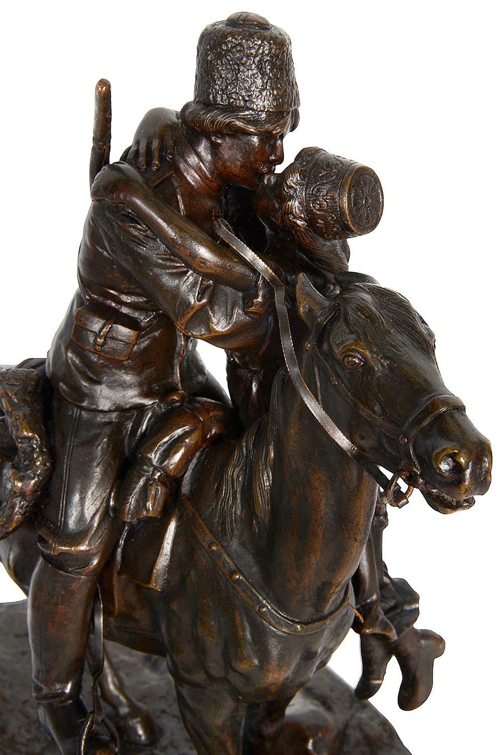 Patinated 19th Century Russian bronze group of lovers on horse back. For Sale