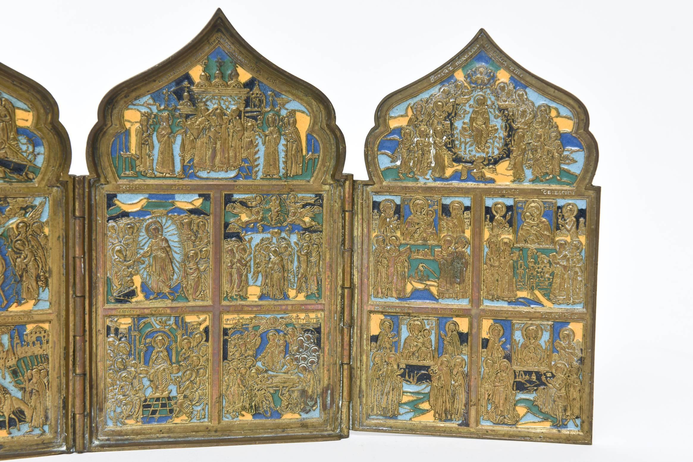This finely made 19th century Sladen traveling icon has four folding panels representing 