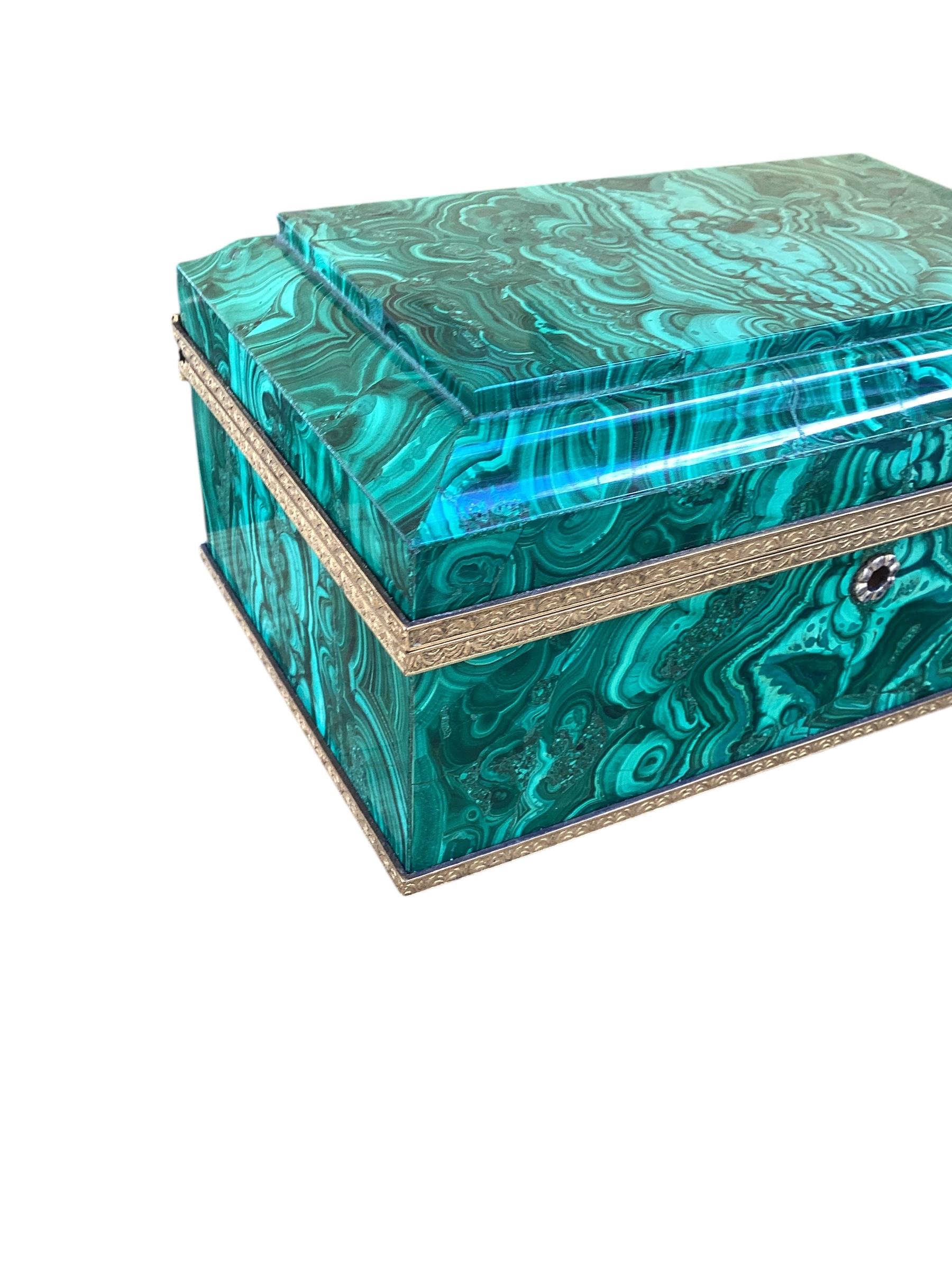 Spectacular Mid 20th Century Russian Ormolu Mounted Malachite Box with Original Key. These boxes were gifted by the Russian government to heads of state during official government visits. There is an example of the same box in the Lyndon B. Johnson
