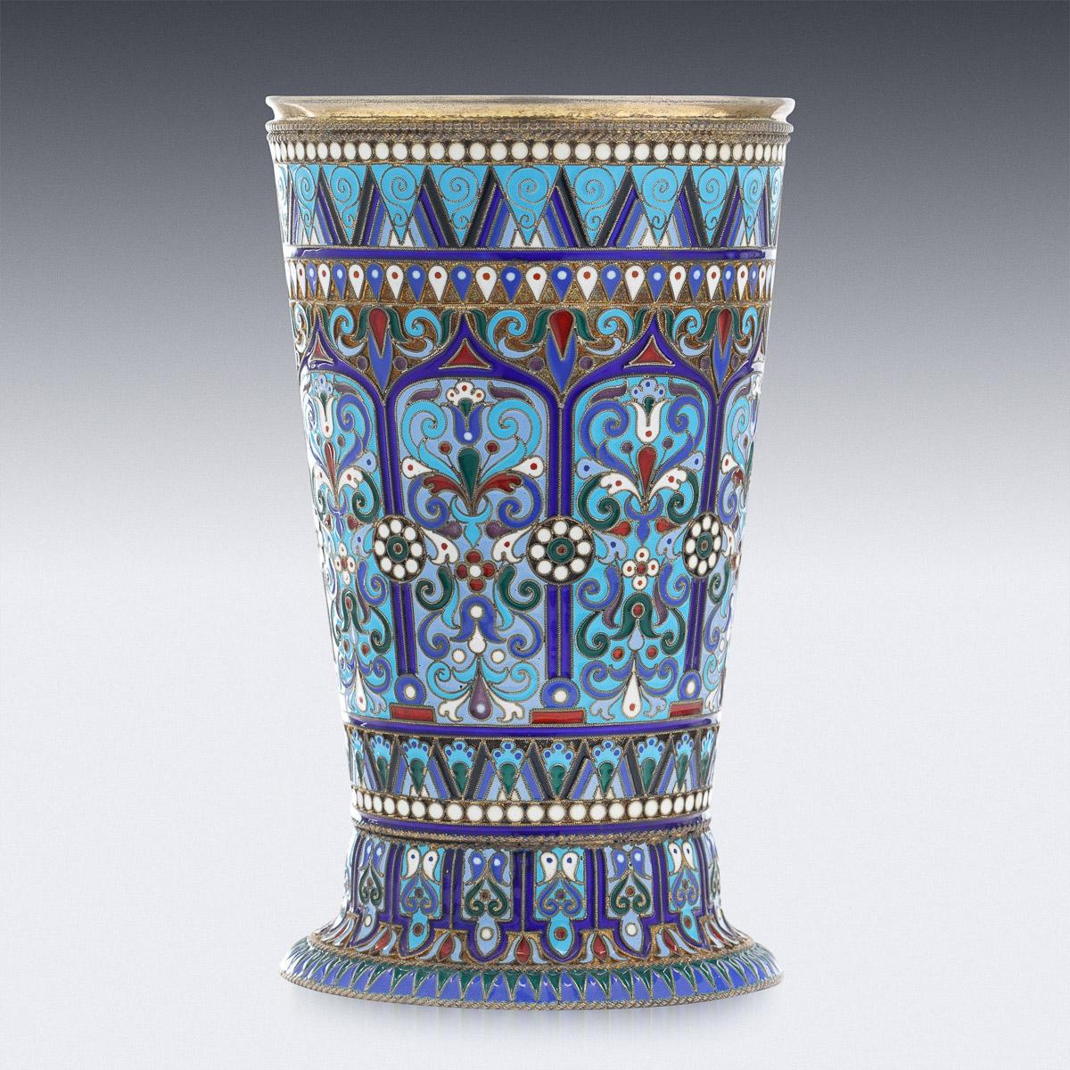 19th Century Imperial Russian silver-gilt & cloisonne enamel large beaker, designed upright with a spreading foot, the body profusely decorated with floral motifs in vary-coloured cloisonné enamel within borders of white pellets.
Hallmarked Russian